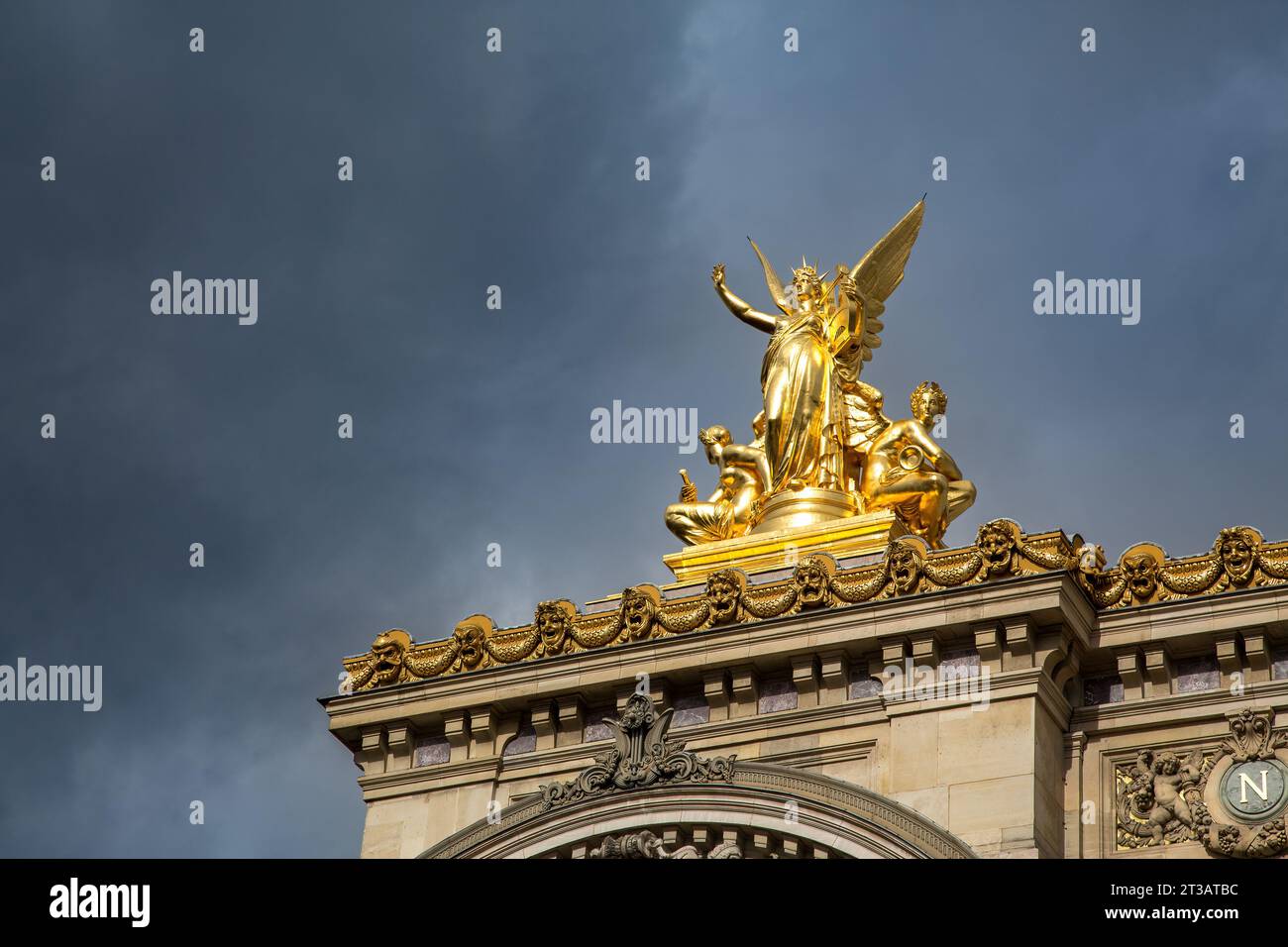 Paris, France - 2 March 2015: The golden statue of Harmony on the roof of the Opera Garnier, or Paris Opera House. Sculpted by Charles Gumery in 1869. Stock Photo