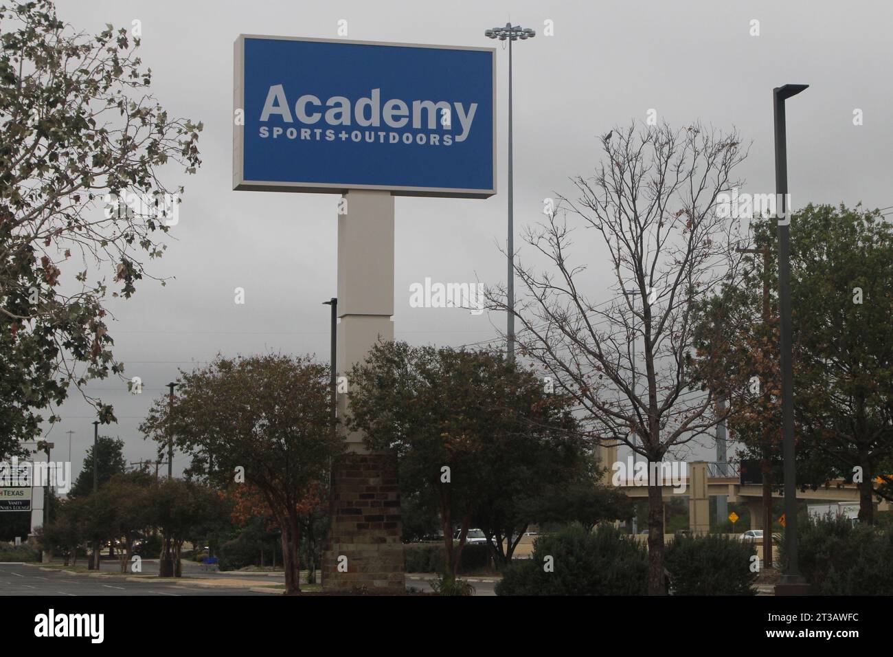 Parking lot sign of an Academy Sports Outdoors store along Interstate