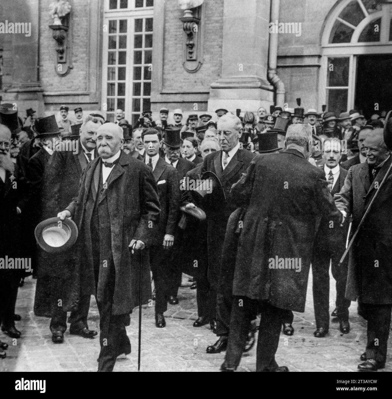 Photography , Exit from the Versailles palace of Georges Clemenceau, English Prime Minister Lloyd Georges and American President Wilson after the signing of the peace treaty in Versailles on June 28, 1919 ( The Treaty of Versailles is a peace treaty signed at Versailles on June 28, 1919 between Germany and the Allies at the end of the First World War. ) Stock Photo