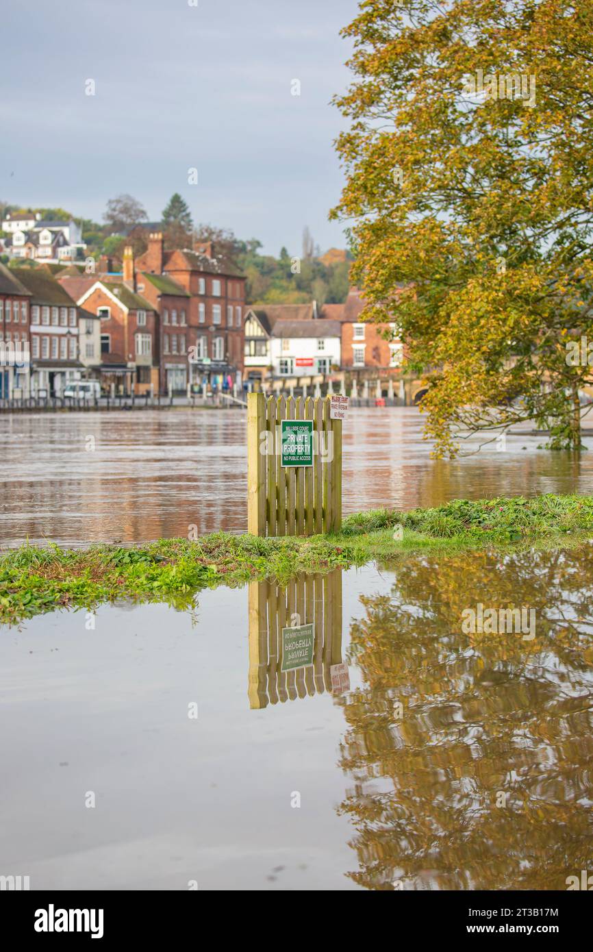 Bewdley, UK. 23rd October, 2023. Bewdley after Storm Babet. River levels remain very high and the flood barriers are still in place as large areas are engulfed by the swollen River Severn. Credit: Lee Hudson Stock Photo