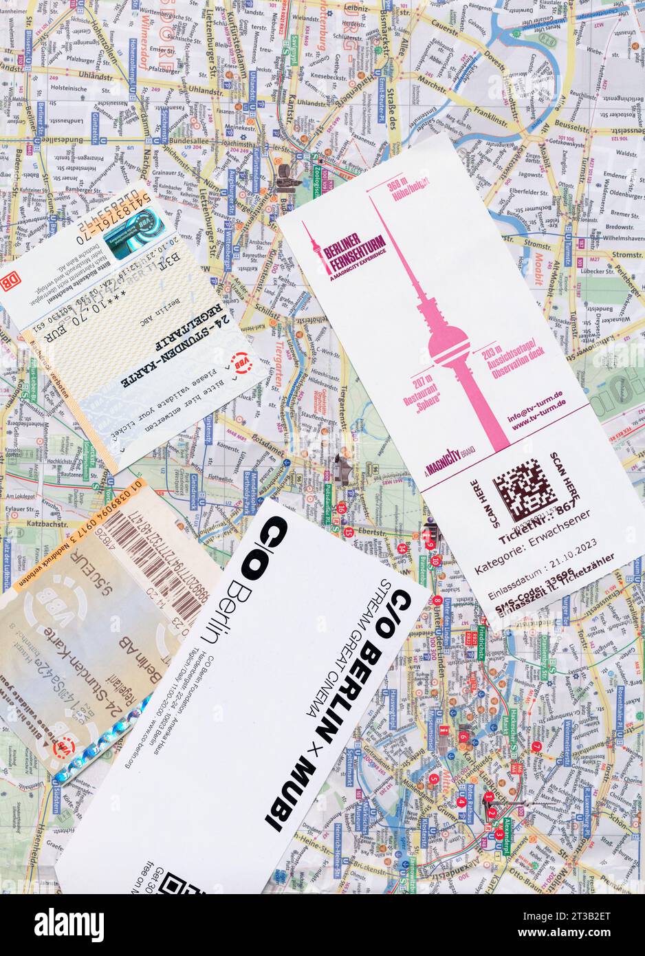 Germany, Berlin, Tourist map with train tickets and museum passes. Stock Photo