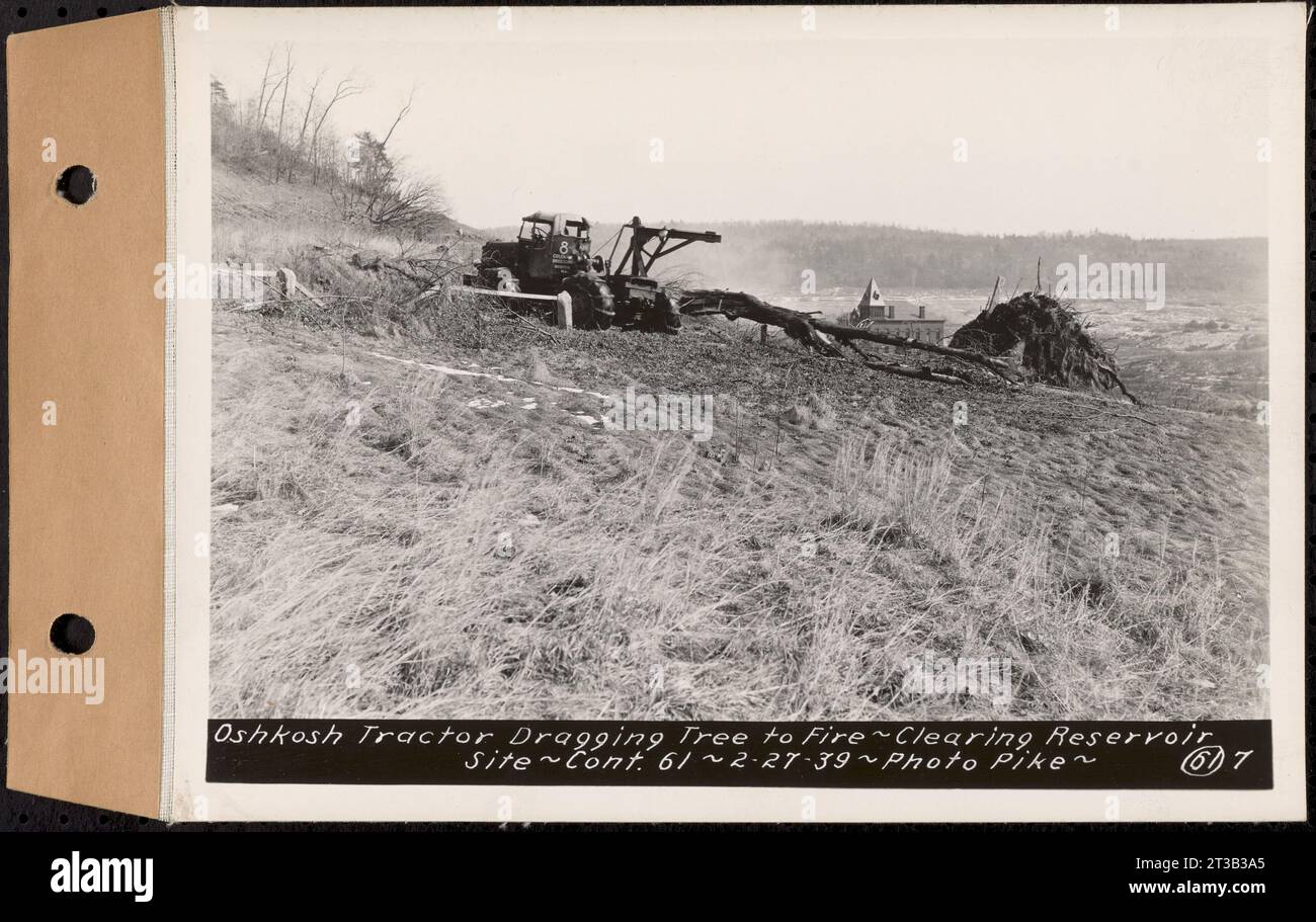 Contract No. 61, Clearing West Branch, Quabbin Reservoir, Belchertown, Pelham, Shutesbury, New Salem, Ware (including in areas of former towns of Enfield and Prescott), Oshkosh tractor dragging tree to fire, Enfield, Mass., Feb. 27, 1939 Stock Photo