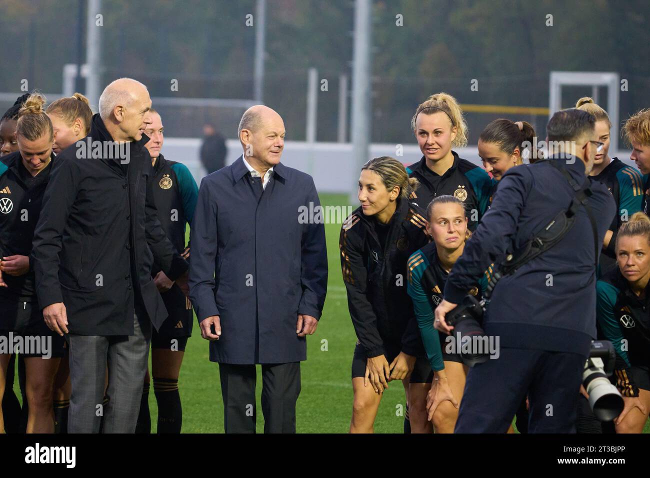 24 October 2023, Hesse, Frankfurt/Main: German Chancellor Olaf Scholz (SPD, M) and DFB President Bernd Neuendorf (l) visit the training of the women's national soccer team at the DFB campus. Photo: Thomas Frey/dpa Credit: dpa picture alliance/Alamy Live News Stock Photo
