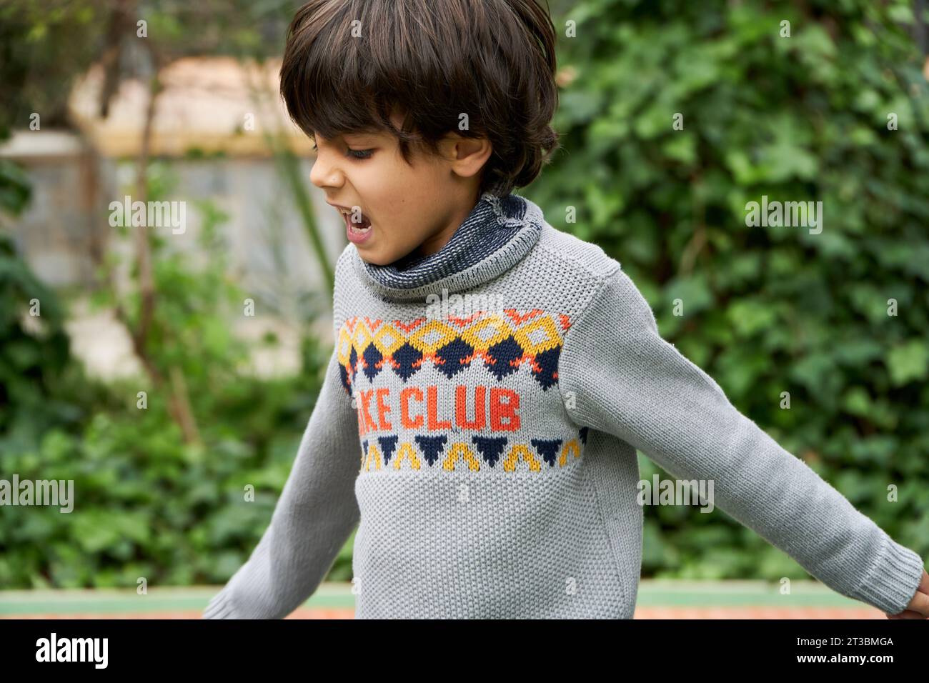 Elementary age angry boy shouting stock photo alamy