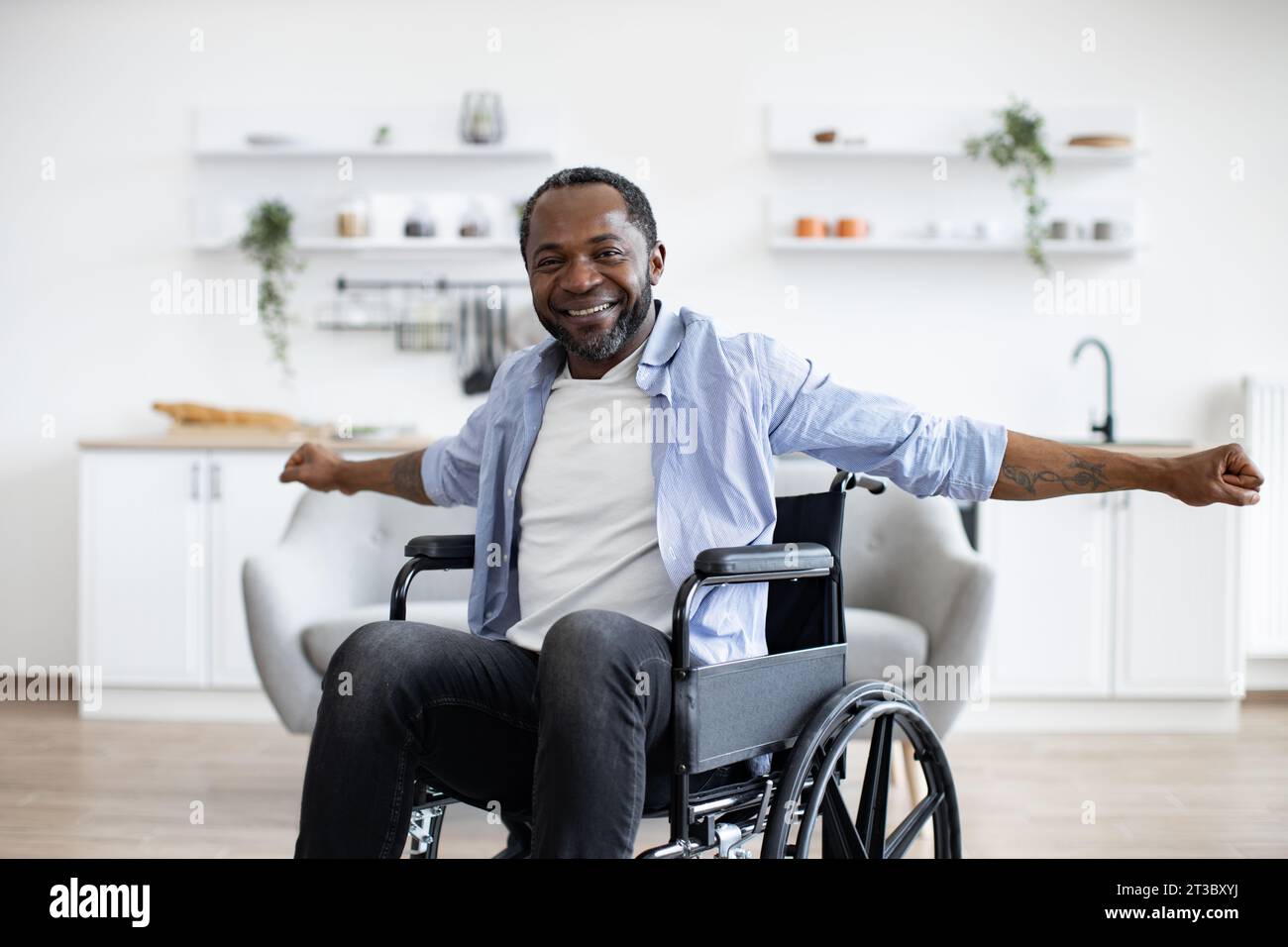 Man stretching arms raising african hi-res stock photography and images ...