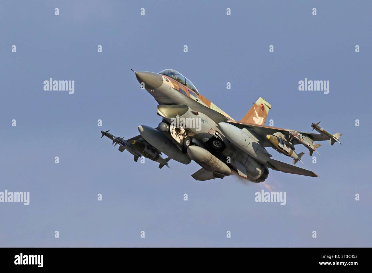 Israeli Air Force F-16D Barak taking off, armed with JDAM bomb, Python5 and Sidewinder missiles. Stock Photo