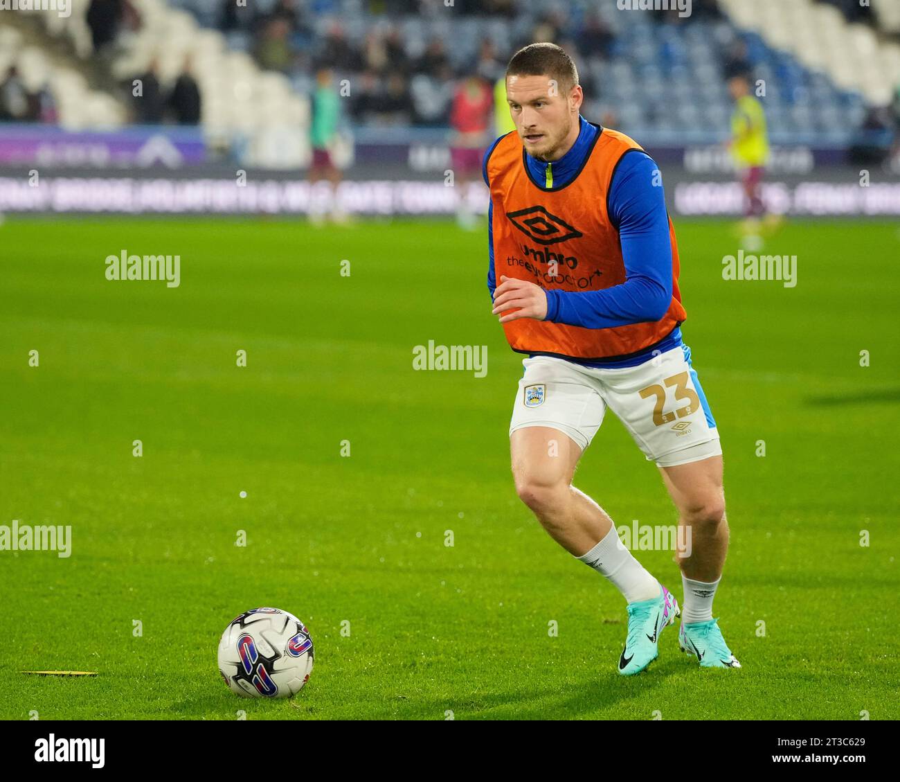 Ben Wiles #23 of Huddersfield Town warms up before the Sky Bet 