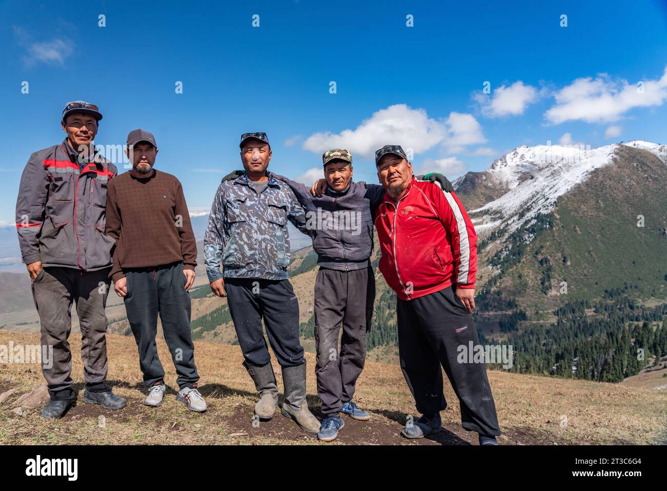 Local guides posing at Karakol ski resort, Kyrgyzstan Stock Photo