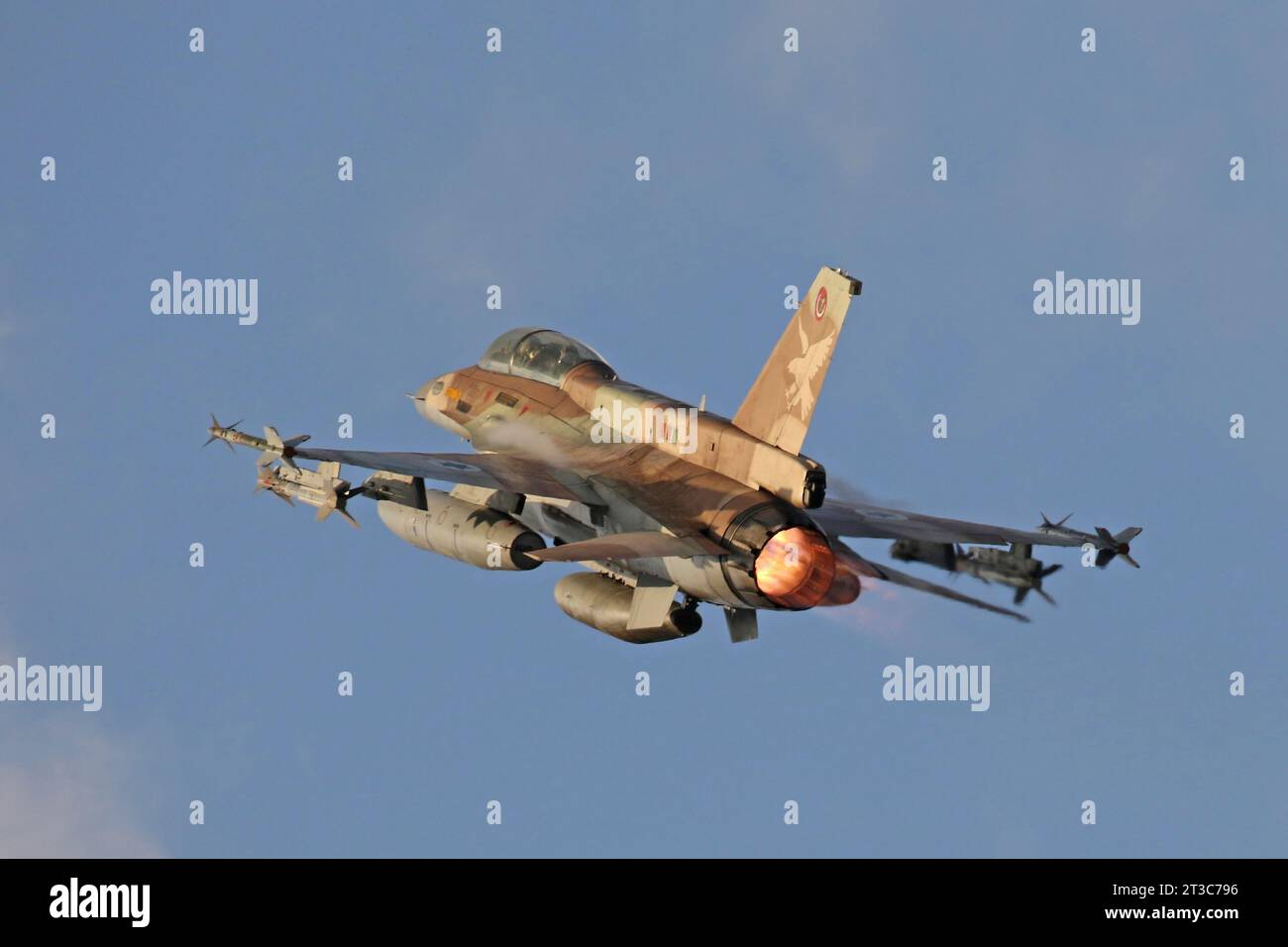 An Israeli Air Force F-16D Barak taking off, armed with missiles. Stock Photo
