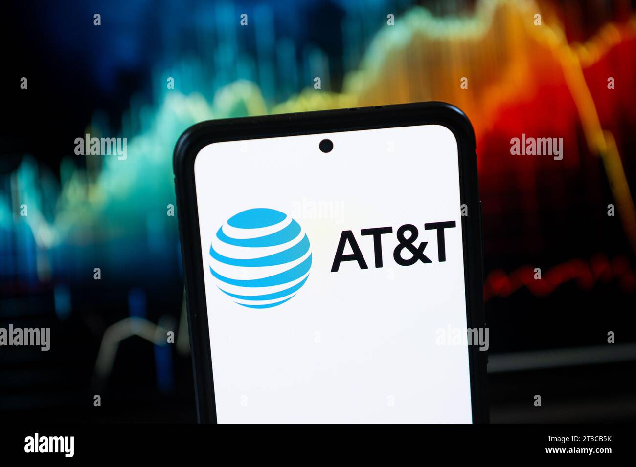 In this photo illustration a AT&T logo seen displayed on a smartphone ...