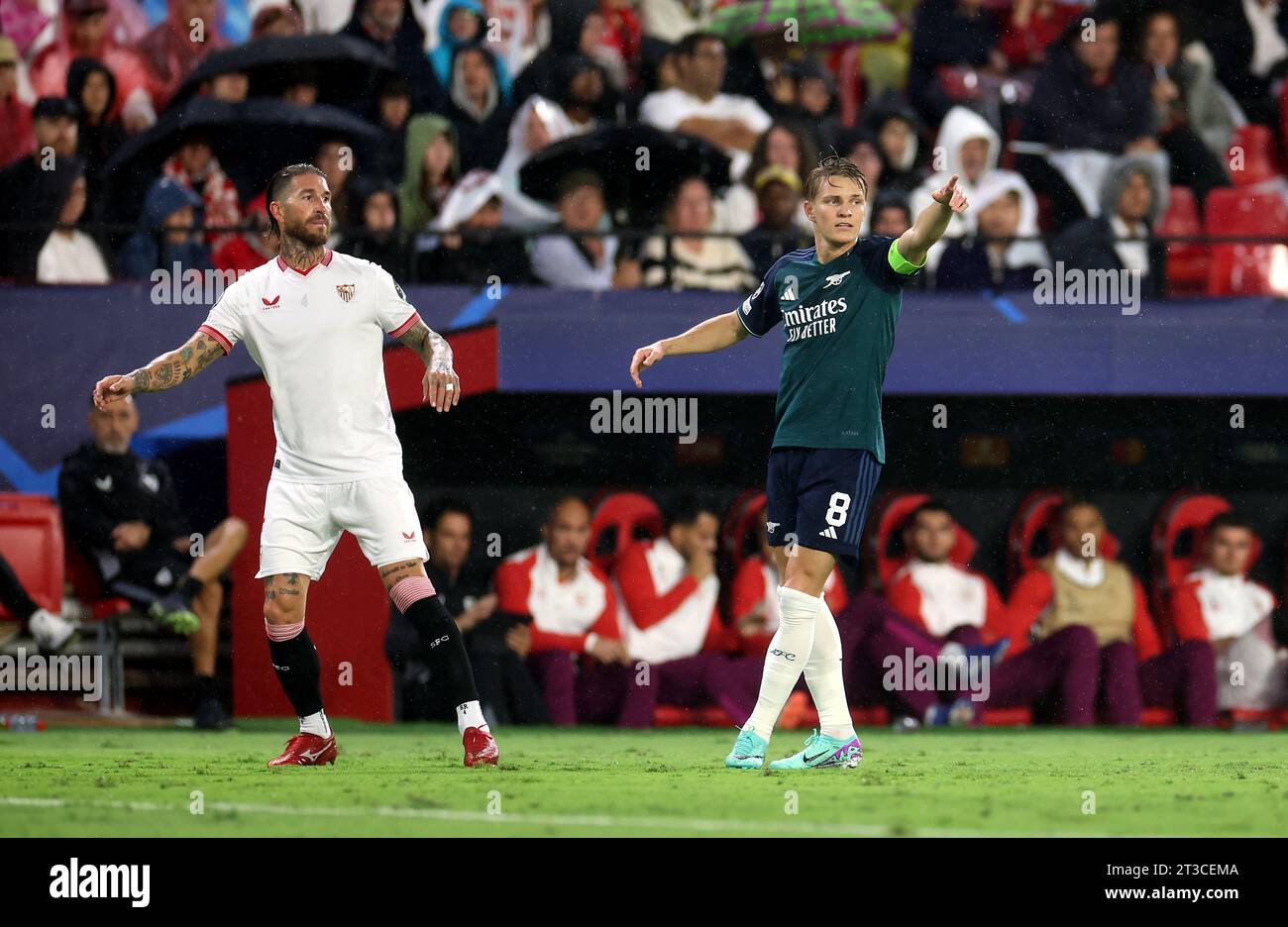 Sevilla's Sergio Ramos and Arsenal's Martin Odegaard during the UEFA Champions League group B match at the Ramon Sanchez-Pizjuan Stadium, Seville, Spain. Picture date: Tuesday October 24, 2023. Stock Photo