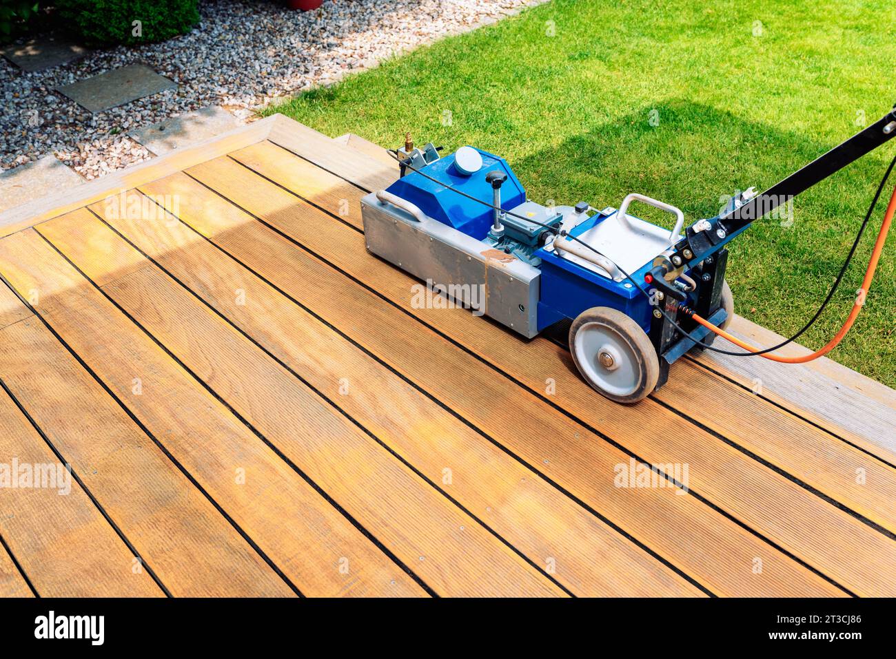 Terrace Machine Cleaning brown wooden floor hi-res stock photography and images - Alamy