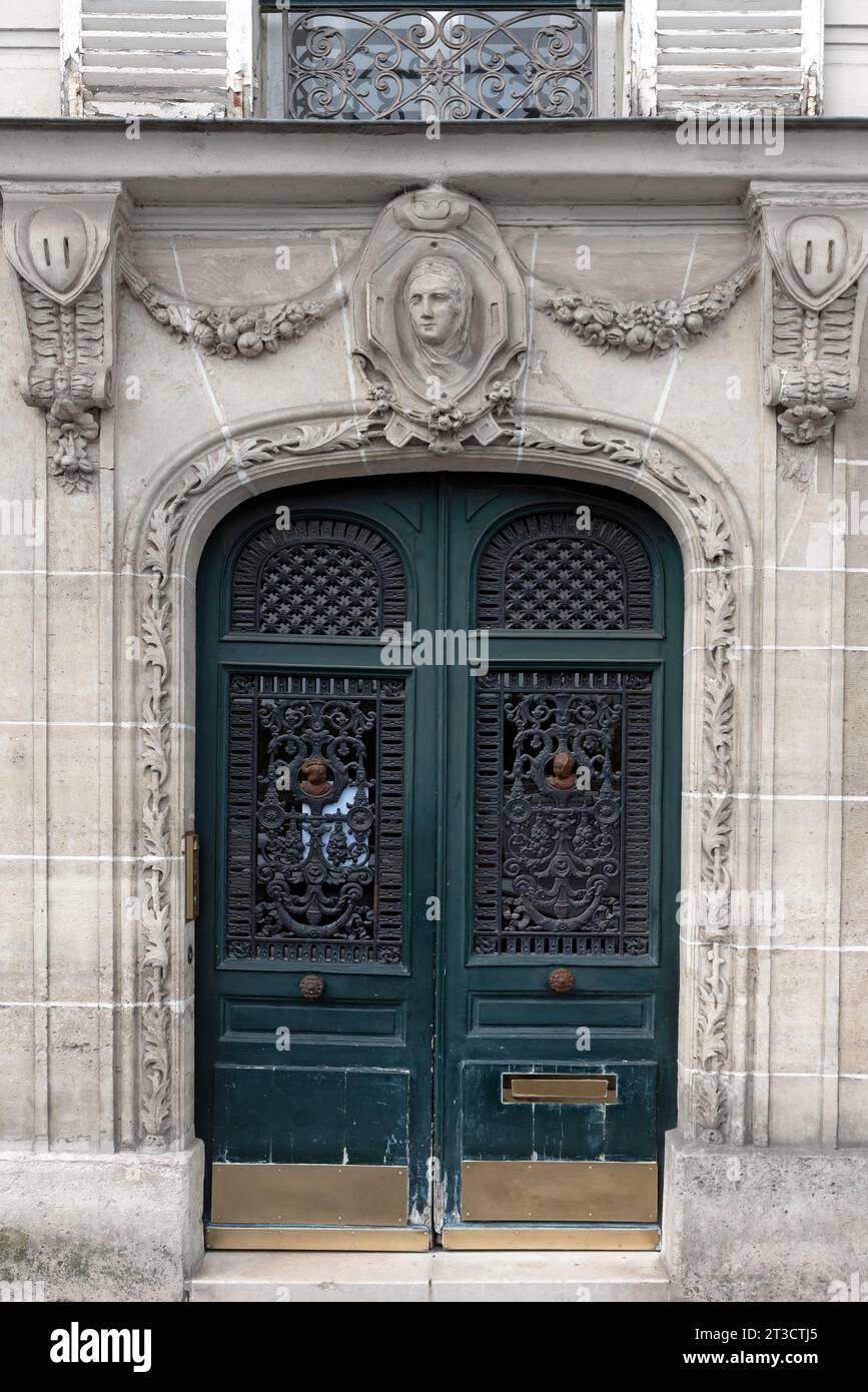 Decorative entrance portal of a residential house around 1870, Paris, France Stock Photo