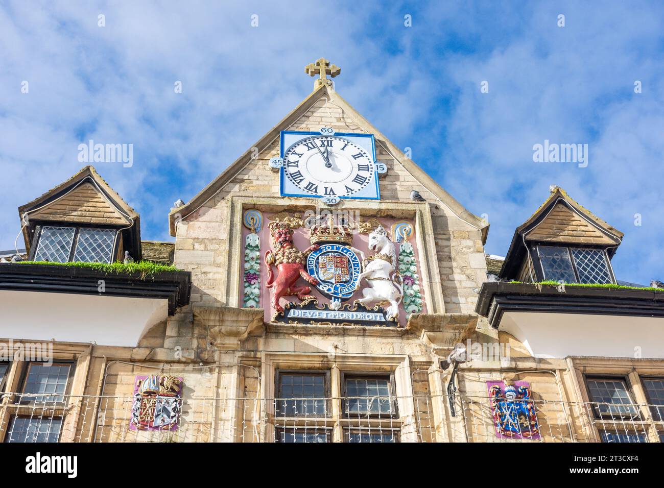 Royal Coat of Arms on facade of 17th century The Guildhall (Butter Cross), Cathedral Square, Peterborough, Cambridgeshire, England, United Kingdom Stock Photo
