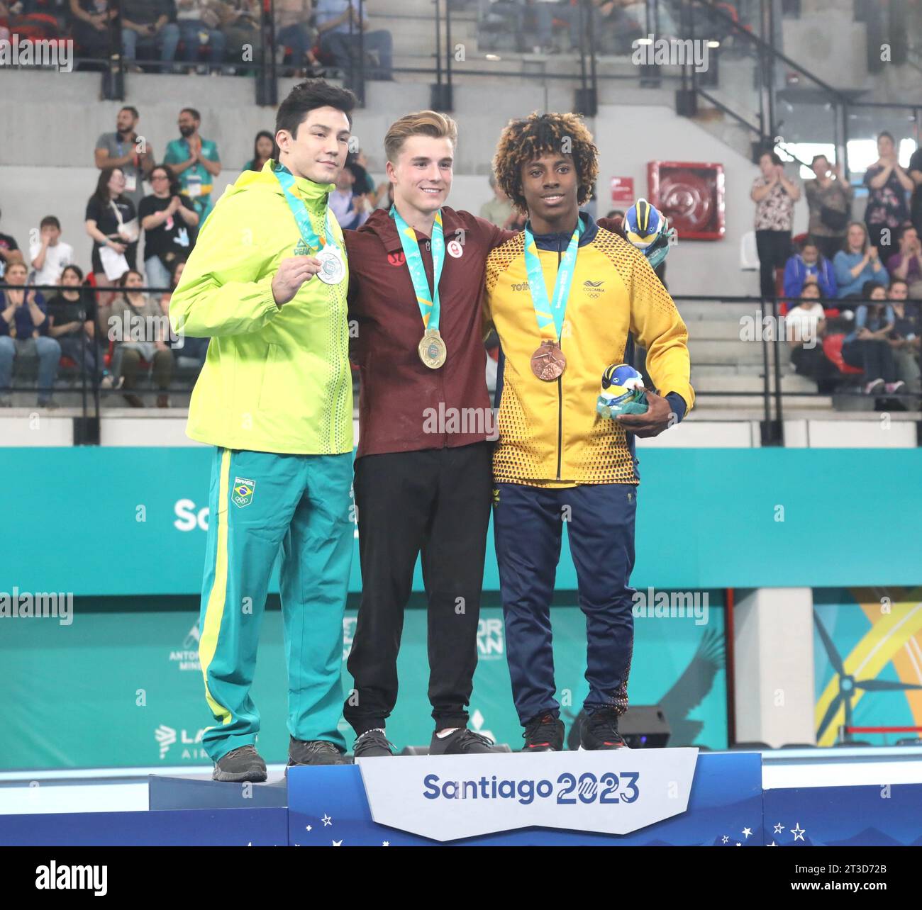 Santiago, Chile, USA. 24th Oct, 2023. SANTIAGO (CHL), 10/24/2023 - CEREMONY/FINAL/FLOOR/MEN - Medal ceremony for the Men's Floor Final with Canadian DOLCI Felix with Gold.Brazilian MARIANO Arthur with Silver and Colombian LARRAHONDO Juan with Bronze.at the gymnastics center at the National Stadium, Santiago. (Credit Image: © Niyi Fote/TheNEWS2 via ZUMA Press Wire) EDITORIAL USAGE ONLY! Not for Commercial USAGE! Stock Photo