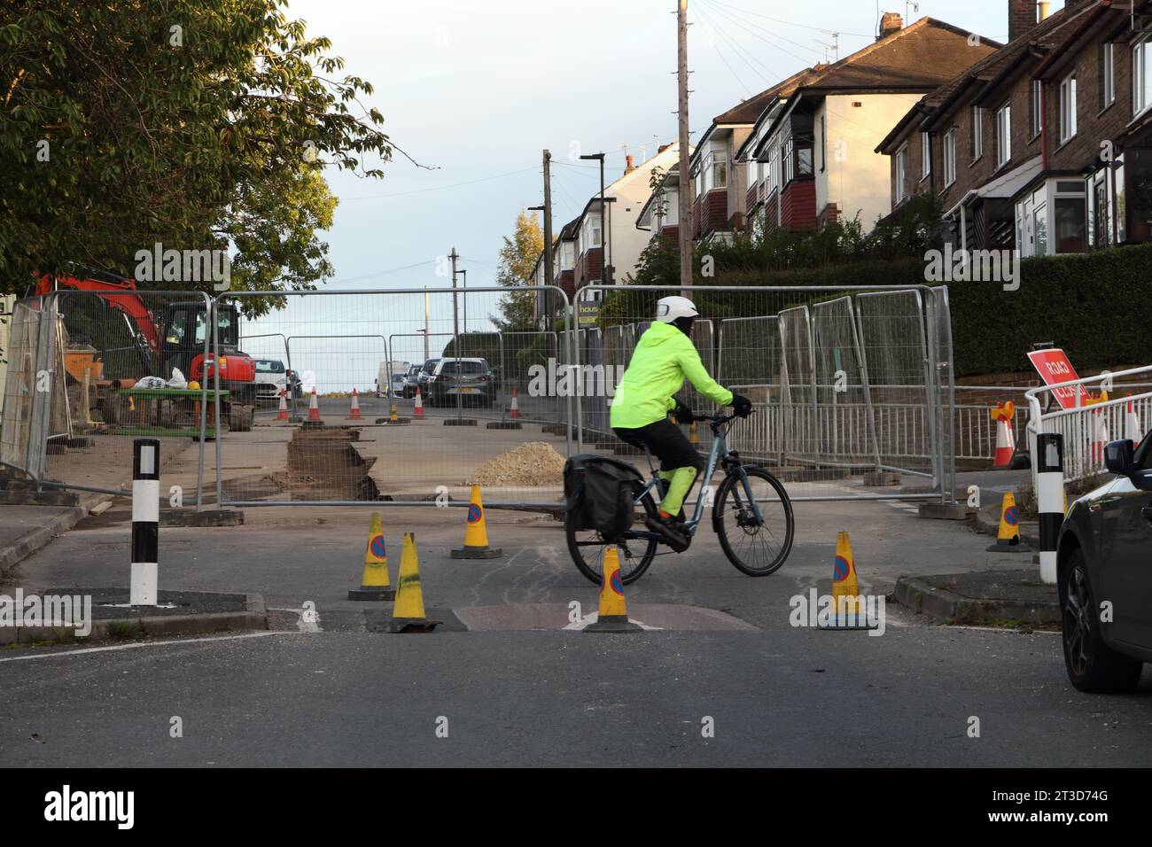 Fraser road Sheffield England UK closed for roadworks, cyclist negotiating the obstacles Stock