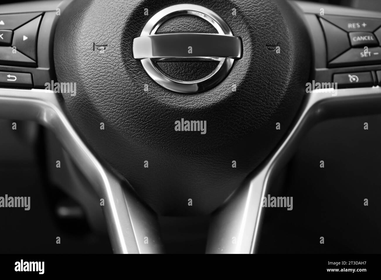 Safety airbag sign on steering wheel in car, closeup Stock Photo