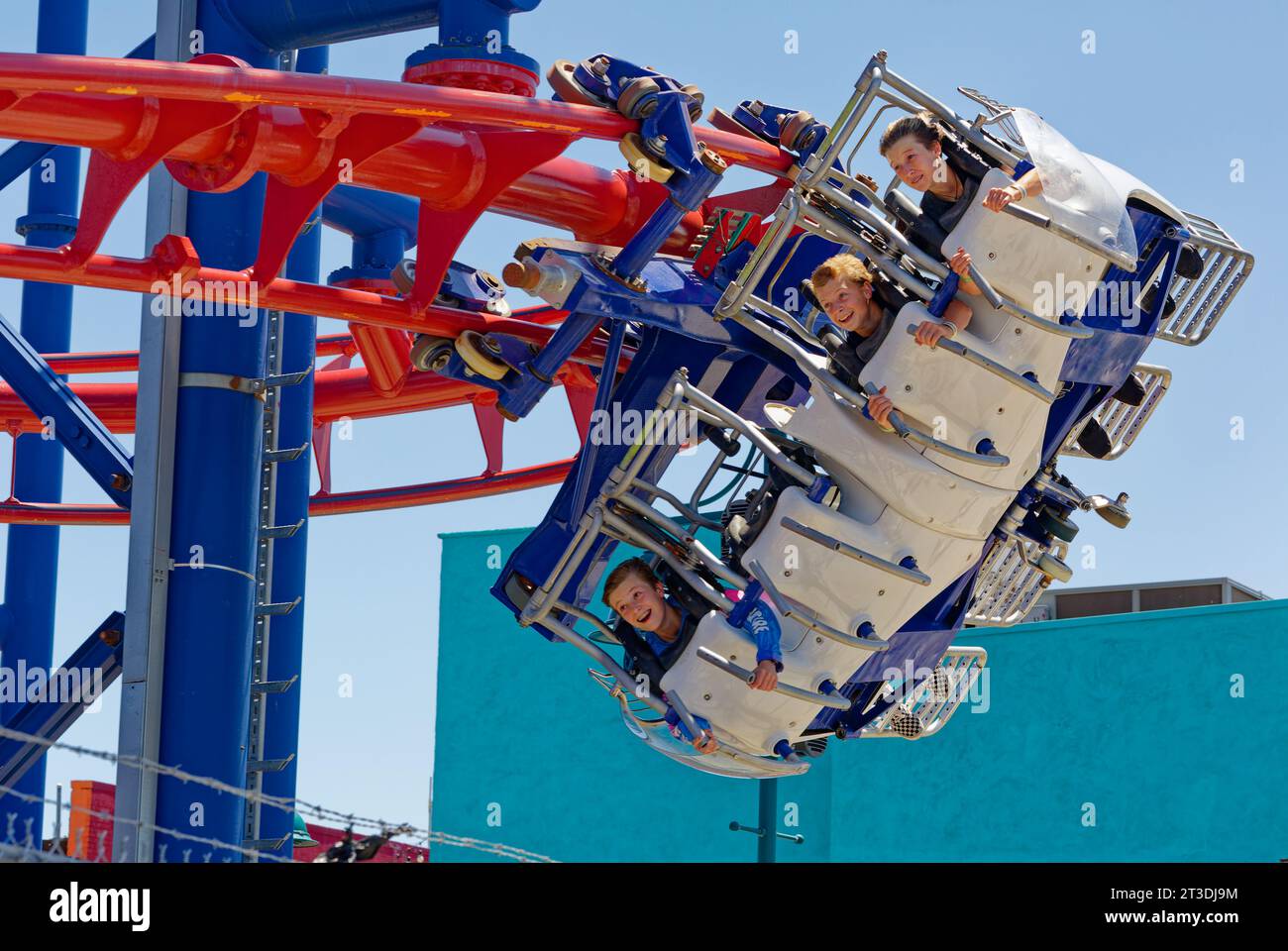 Soarin’ Eagle is a roller coaster with a twist – you “fly” in head-first prone position, instead of seated in carriages. Stock Photo