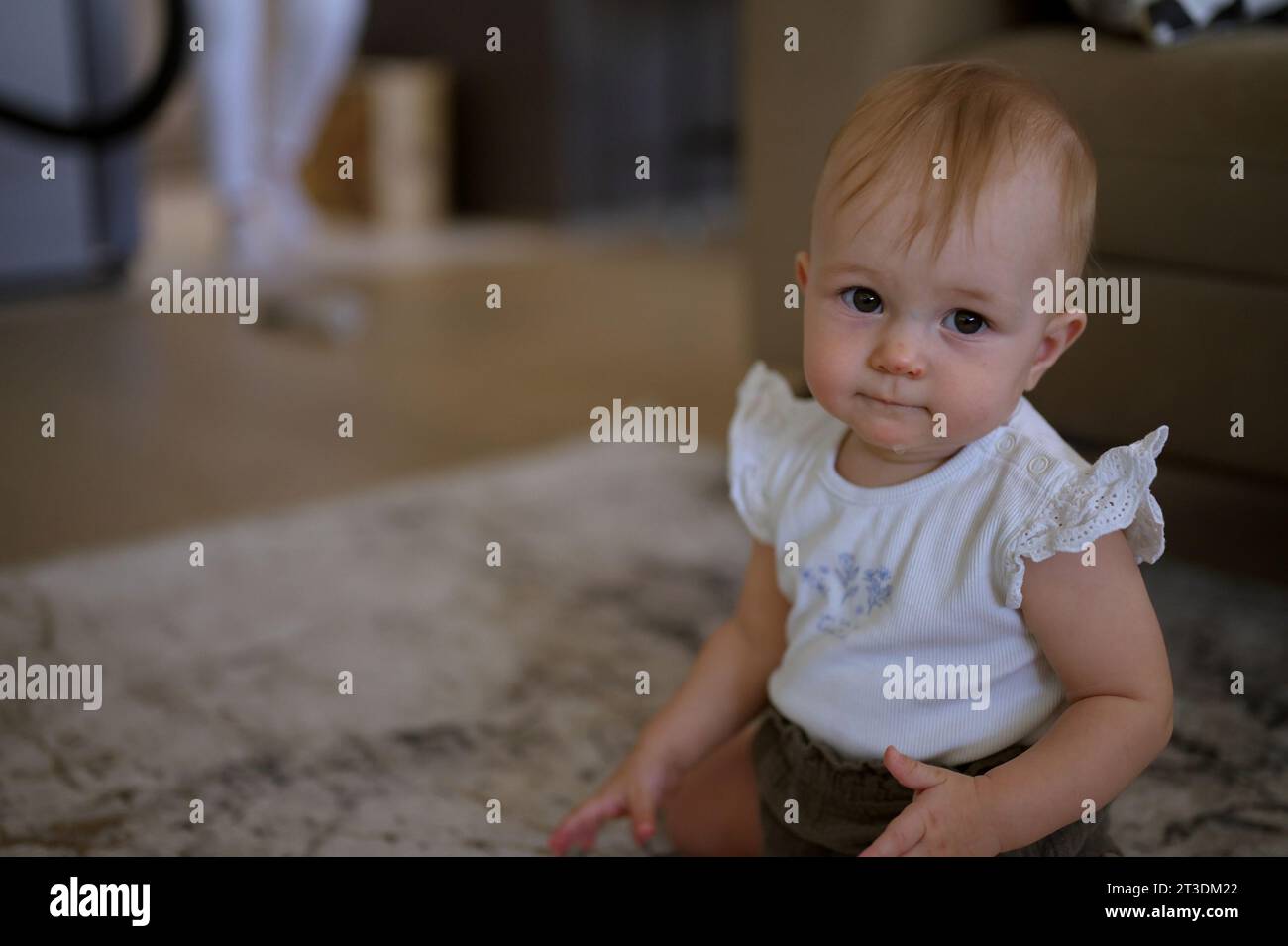 Pretty Little Baby Girl Sitting On Floor Isolated Stock Image Image