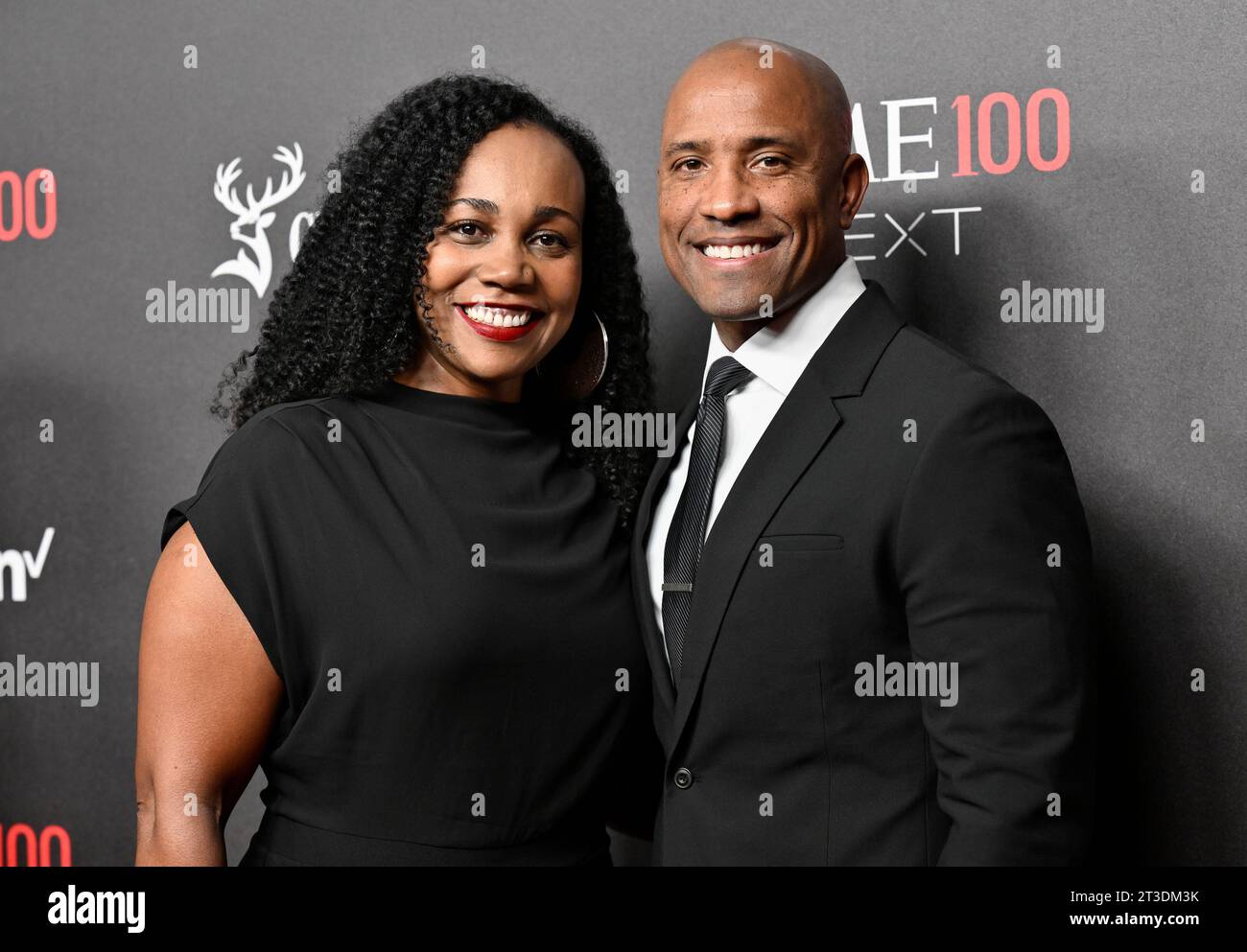 Astronaut Victor J. Glover, right, and wife Dionna Odom Glover attend