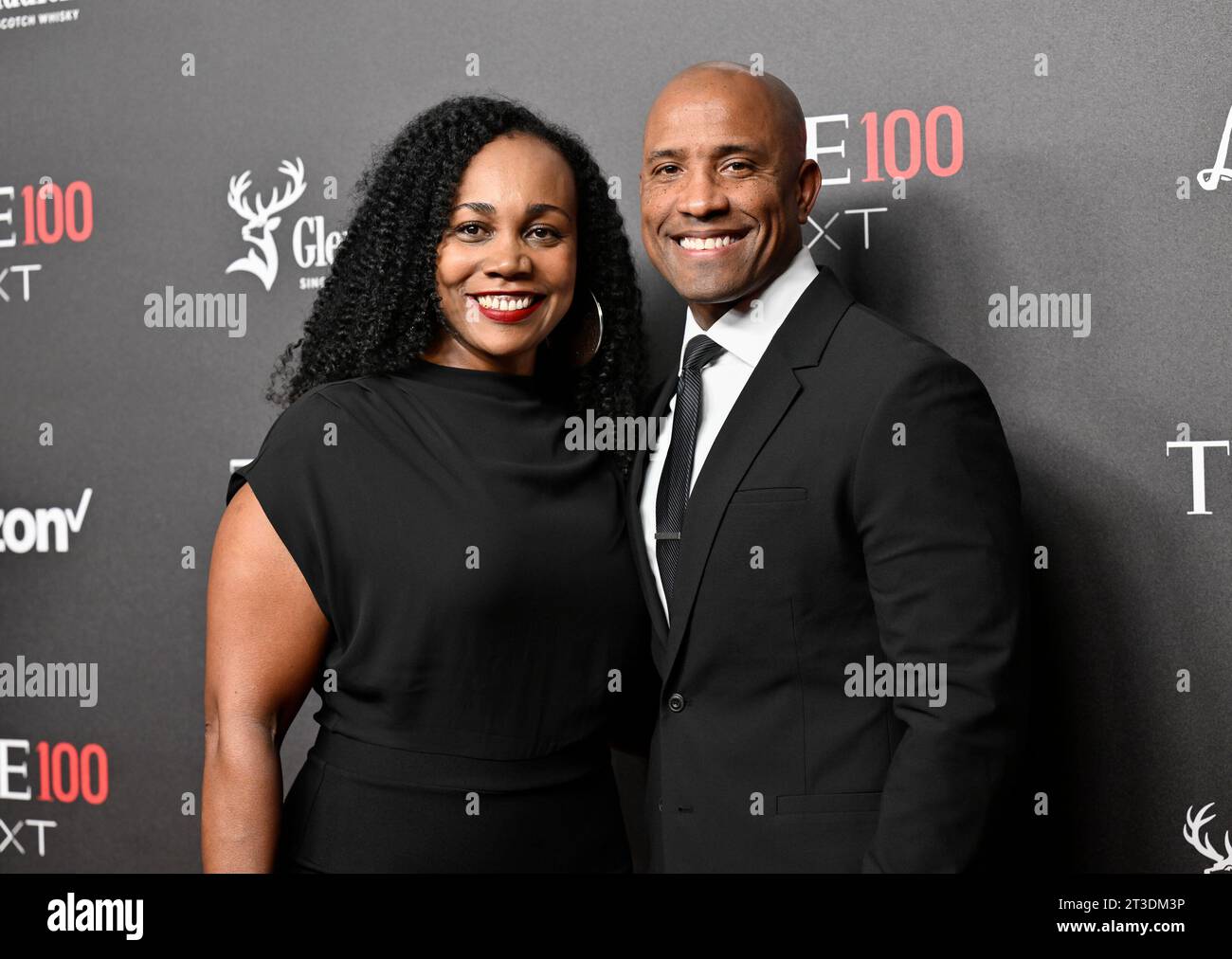 Astronaut Victor J. Glover, right, and wife Dionna Odom Glover attend