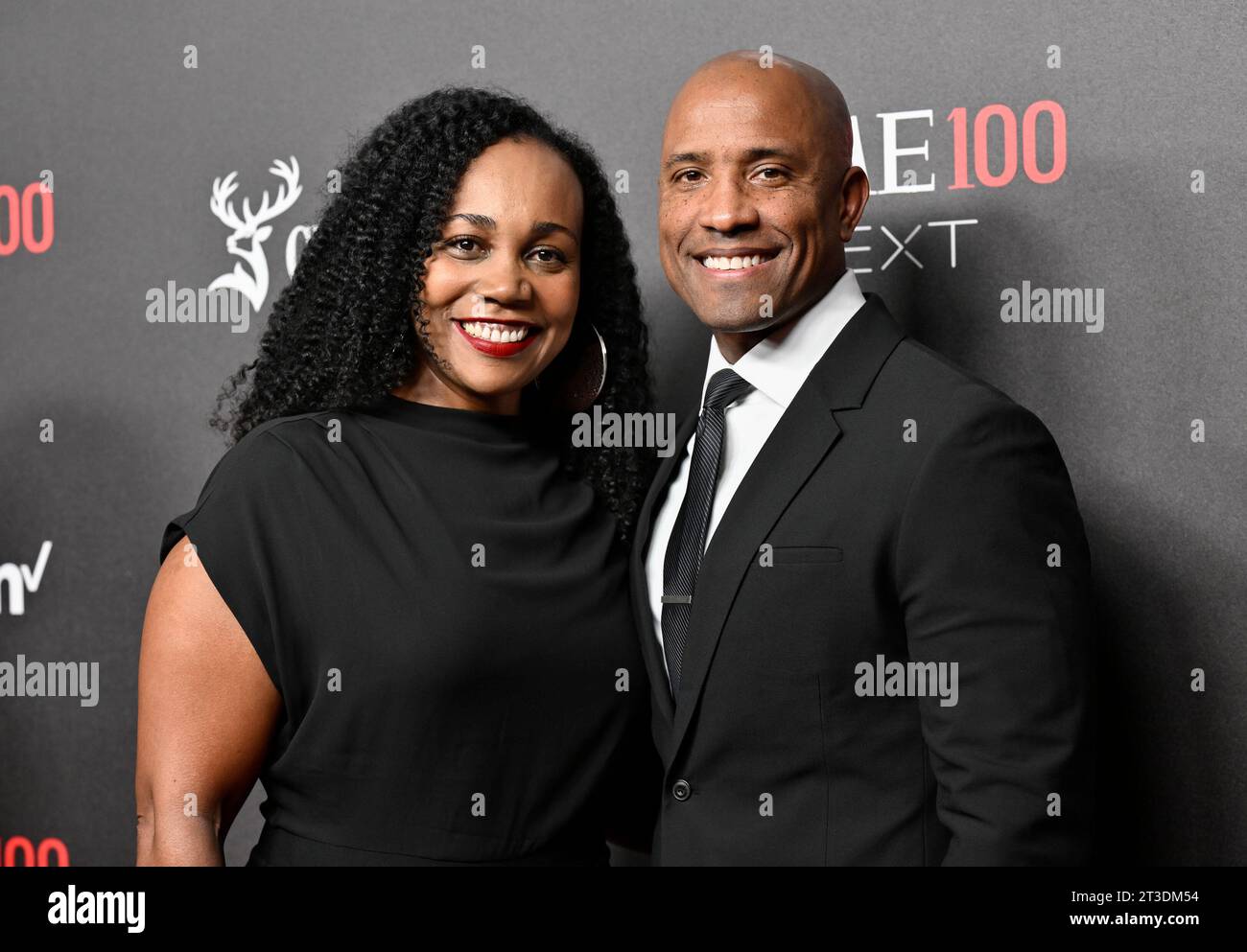 Astronaut Victor J. Glover, right, and wife Dionna Odom Glover attend