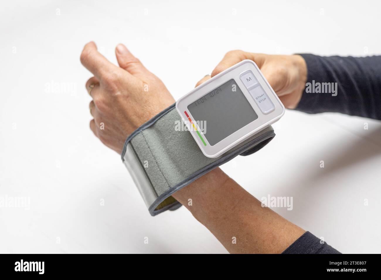 Bp Monitor Hand Putting pressure hi-res stock photography and images - Alamy