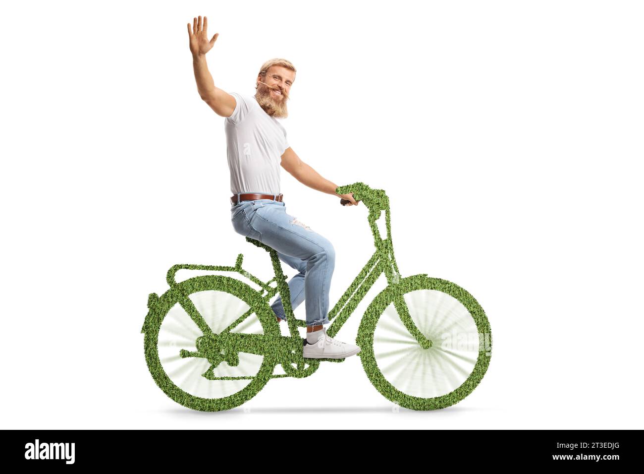 Guy riding a green bicycle and waving at camera isolated on white background Stock Photo
