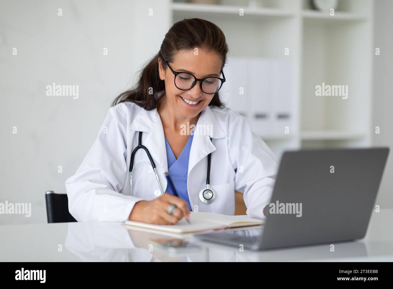 Doctor taking notes telehealth hi-res stock photography and images - Alamy