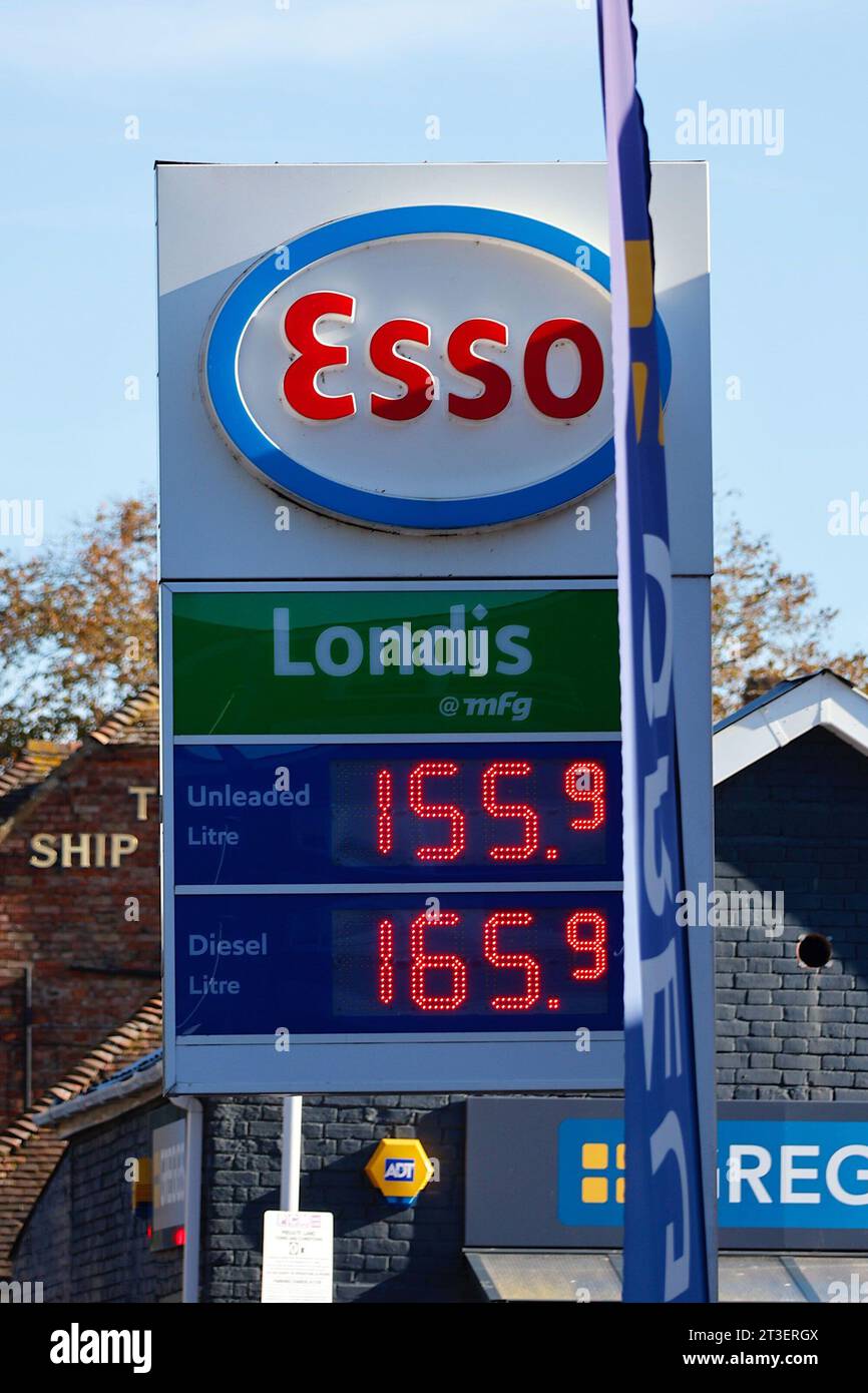 New Romney, Kent, UK. 25 October, 2023. Fuel prices have been slowly creeping up in recent weeks. An Esso petrol station forecourt on the high street of New Romney. Photo Credit: News PAL /Alamy Live News Stock Photo