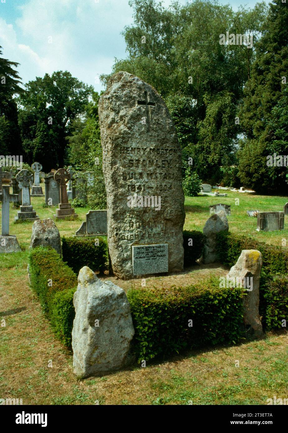 A Dartmoor granite monolith above the grave of Sir Henry Morton Stanley (1841-1904) in St Michael's Churchyard, Pirbright, Surrey, England, UK. Stock Photo