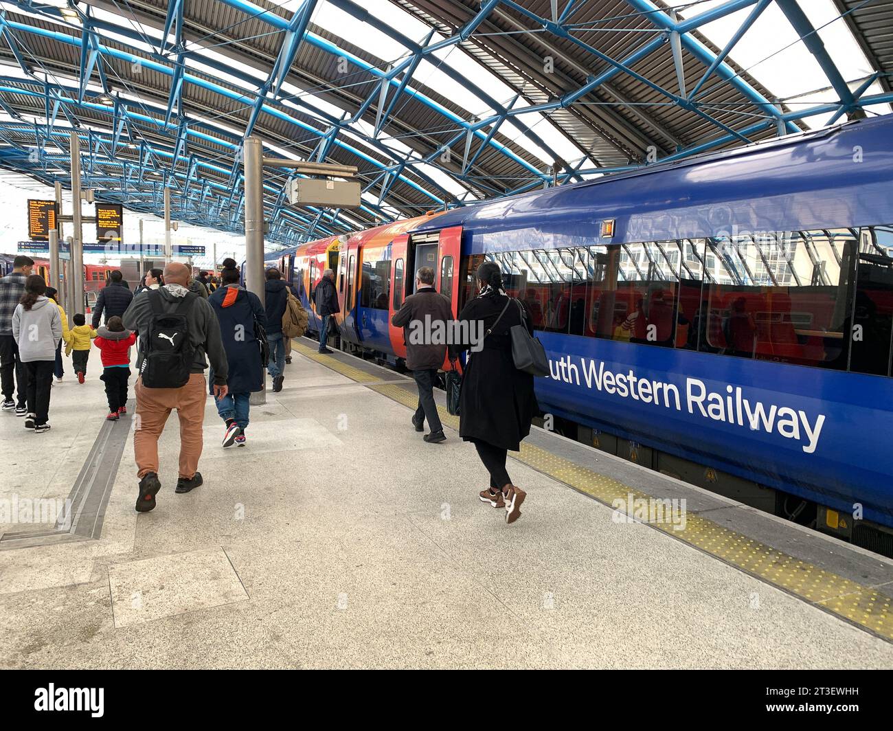 Waterloo, London, UK. 24th October, 2023. Passengers at Waterloo Railway Station in London. It has been announced that one day Travelcards are to continue. This comes as welcome news to rail passengers who would have been facing  higher costs to travel into London from the Home Counties if Sadiq Khan and TfL had scrapped the scheme. In other new, members of the RMT Union have voted in favour of another six months of industrial action. The treat of closing over 1,000 railway station ticket office still continues, however, the proposed plans have received much criticism of disability rights camp Stock Photo