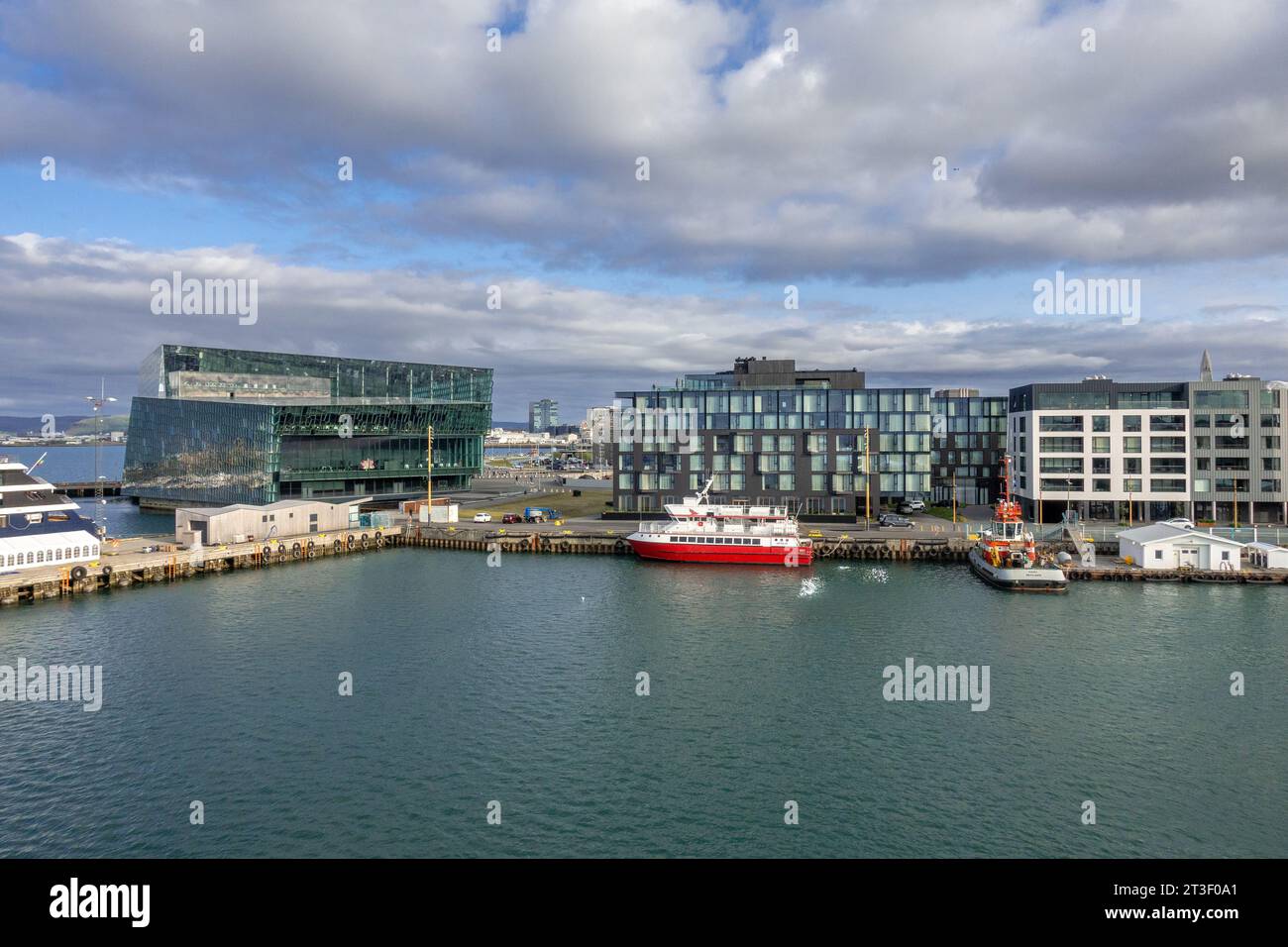 Miðbakki Midbakki The Old Harbour In Reykjavik Iceland With The Harpa Centre And Hotels Stock Photo