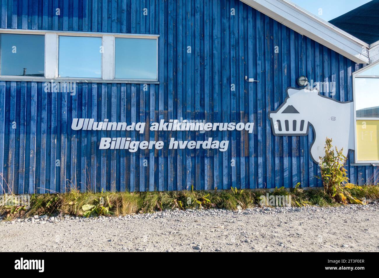 Akiki Supermarket Sign With Polar Bear Logo Outside In Qaqortoq Greenland Building Exterior, Aikiki Is Owned By Pisiffik A/S Stock Photo