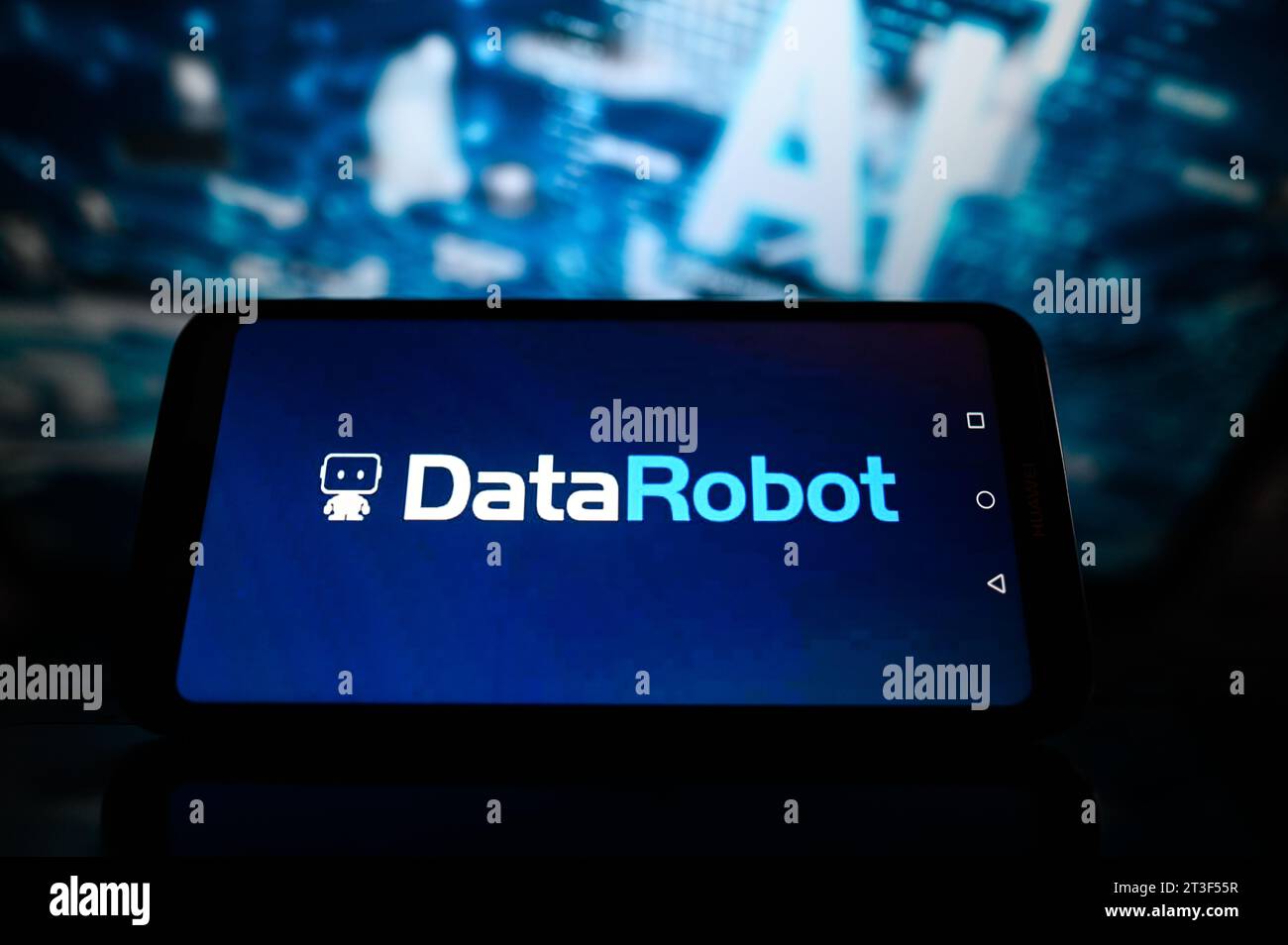 Poland. 25th Oct, 2023. In this photo illustration, a Data Robot logo is displayed on a smartphone with Artificial Intelligence graphics in the background. Credit: SOPA Images Limited/Alamy Live News Stock Photo