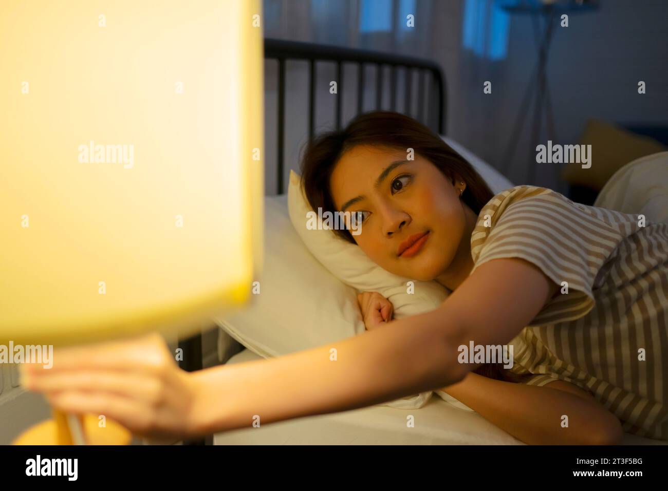 A woman go to sleep at night. Lifestyle concept. Stock Photo