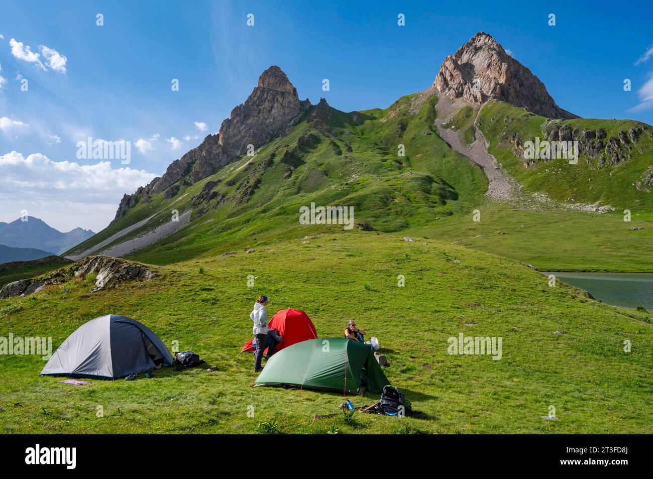 France, Savoie, Cerces massif, Valloires, hike towards Cerces lake, the bivouac tents are set up near the lake at the foot of Ceinture peak and Pointe de la Fourche Stock Photo