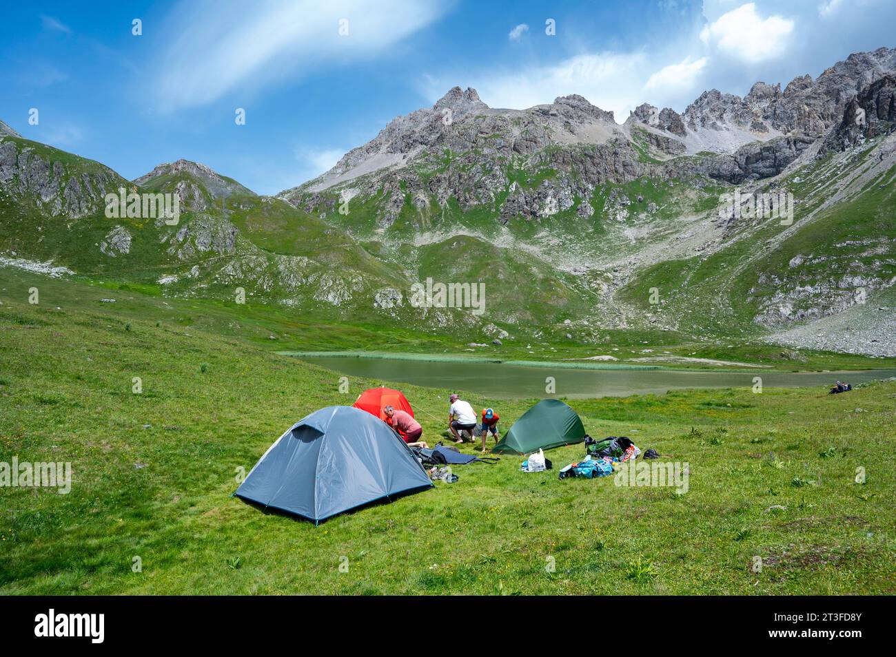France, Savoie, Cerces massif, Valloires, hike towards Lac des Cerces, the bivouac tents are set up near the lake at the foot of Pointe des Blanchets Stock Photo