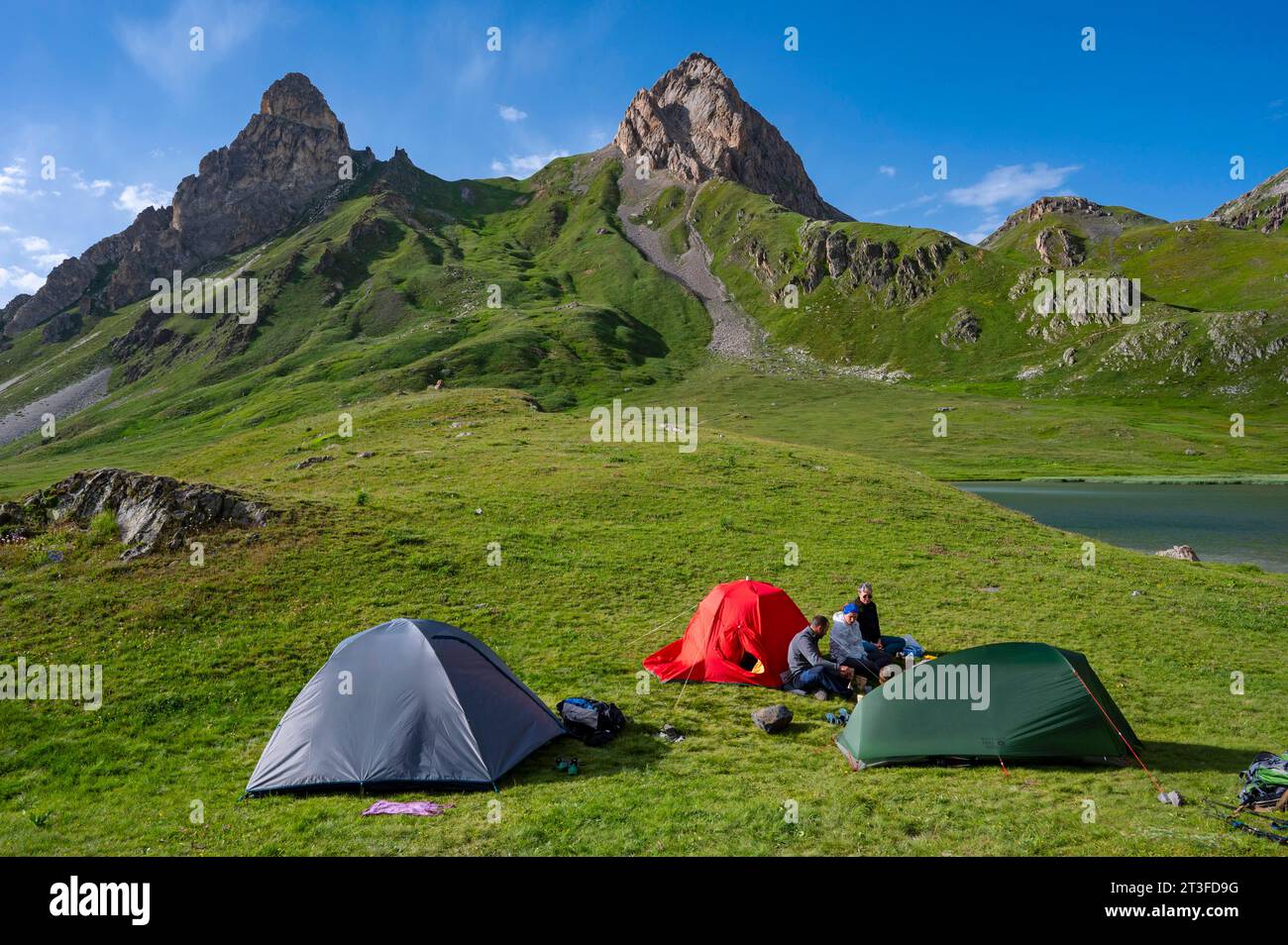 France, Savoie, Cerces massif, Valloires, hike towards Cerces lake, the bivouac tents are set up near the lake at the foot of Ceinture peak and Pointe de la Fourche Stock Photo