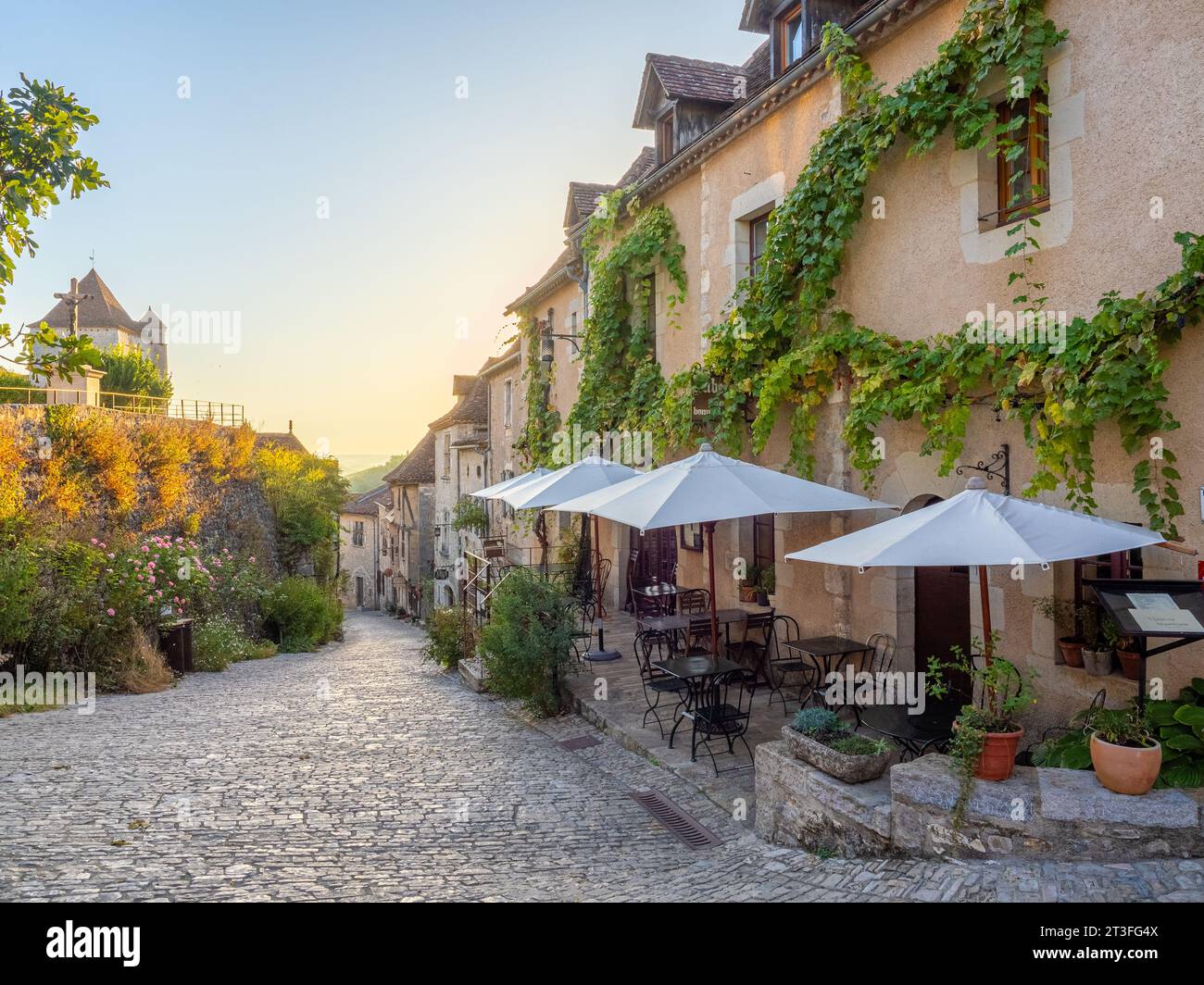 St Cirq Lapopie, Lot, France. Street view of village and restaurant