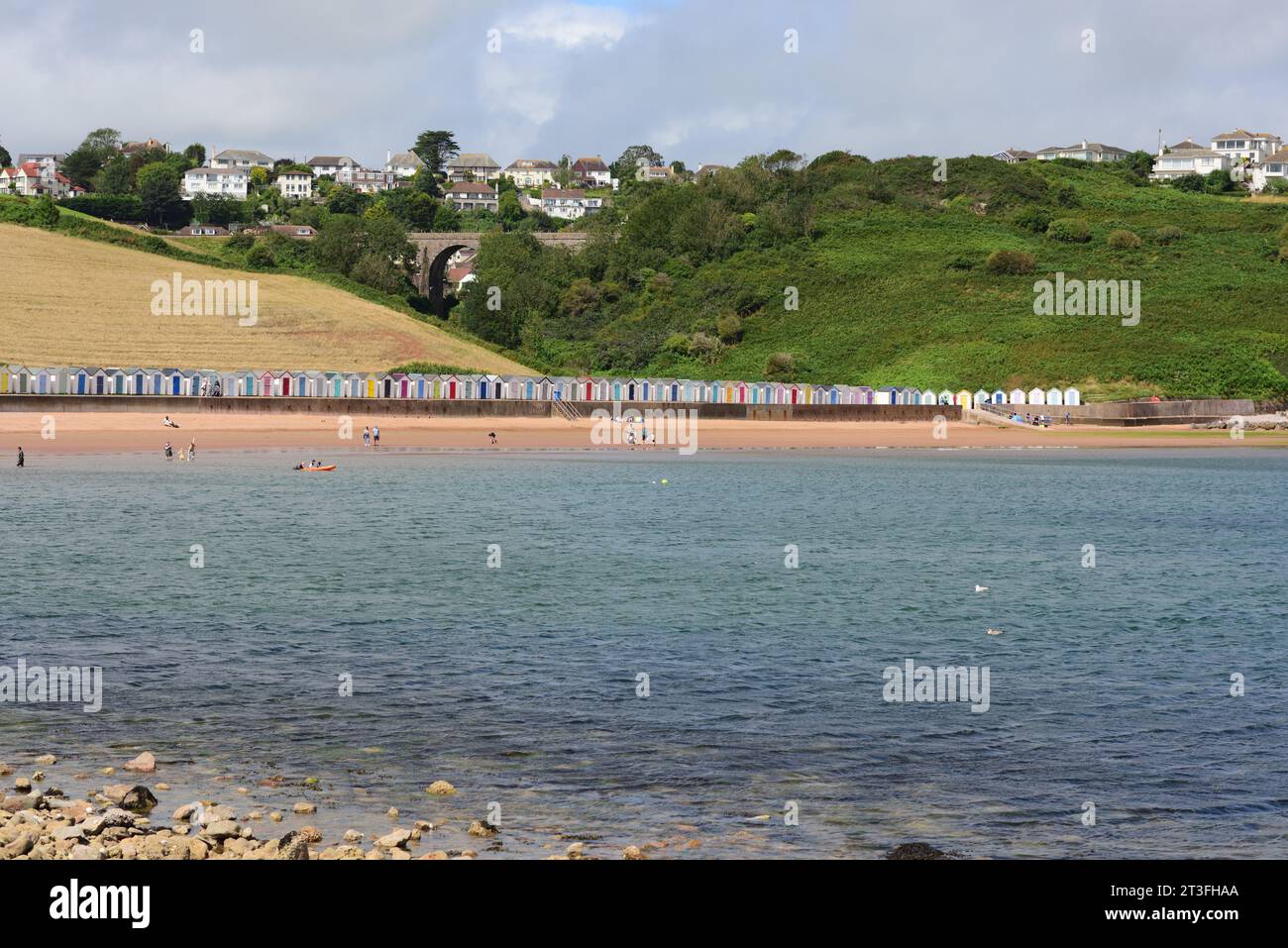 Beach huts at Broadsands beach in Torbay, South Devon, UK Stock Photo