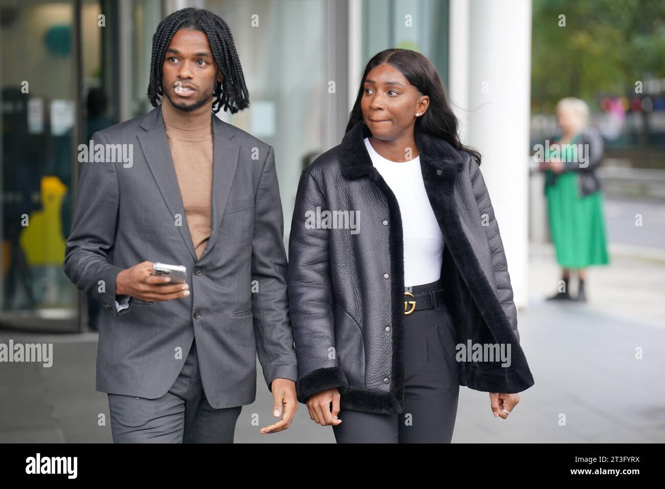 Athletes Bianca Williams and Ricardo Dos Santos walking to speak to the media outside Palestra House, central London, after the judgement was given for the gross misconduct hearing of five Metropolitan Police officers over their stop and search. The disciplinary hearing has found the behaviour of two Metropolitan Police officers - Pc Jonathan Clapham and Pc Sam Franks - amounted to gross misconduct. Acting Police Sergeant Rachel Simpson, Pc Allan Casey and Pc Michael Bond were found not to have breached any standards. Ms Williams and Mr Dos Santos were stopped and handcuffed in Maida Vale, nor Stock Photo