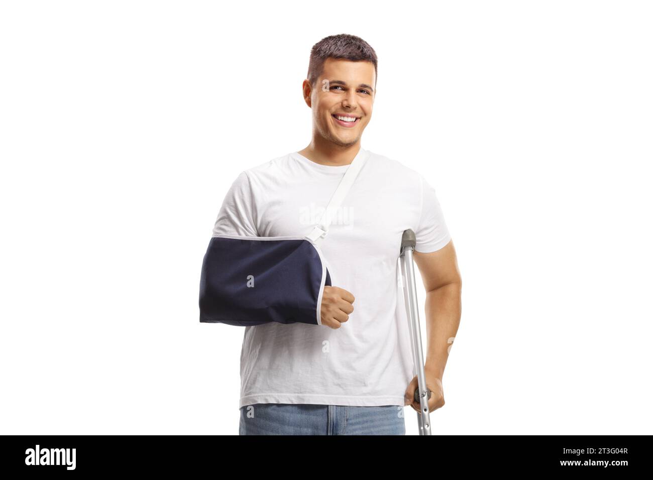 Young man with a broken arm wearing an arm splint and standing with a