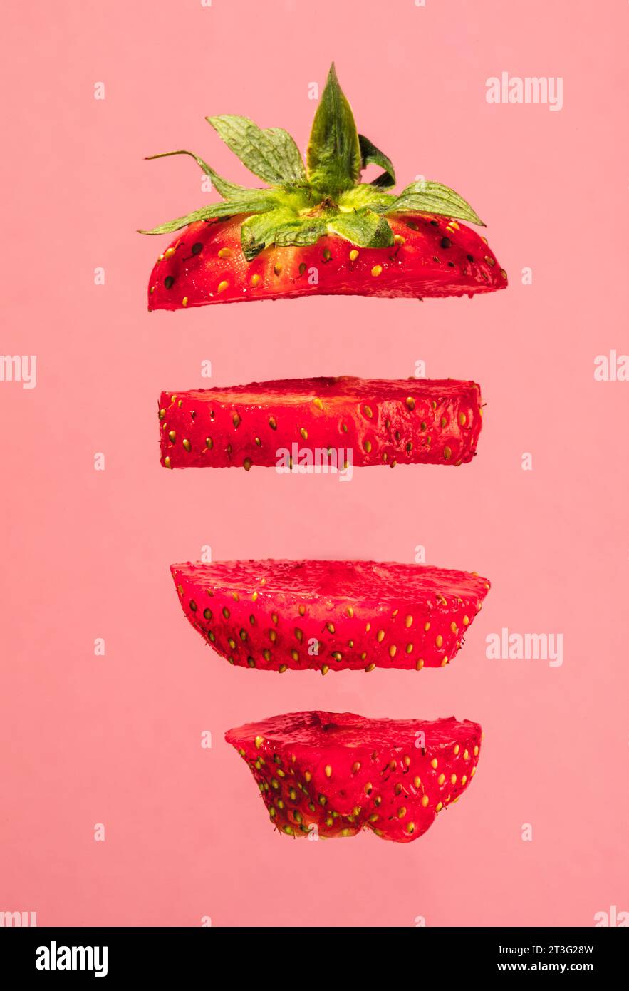 falling sliced strawberry Stock Photo