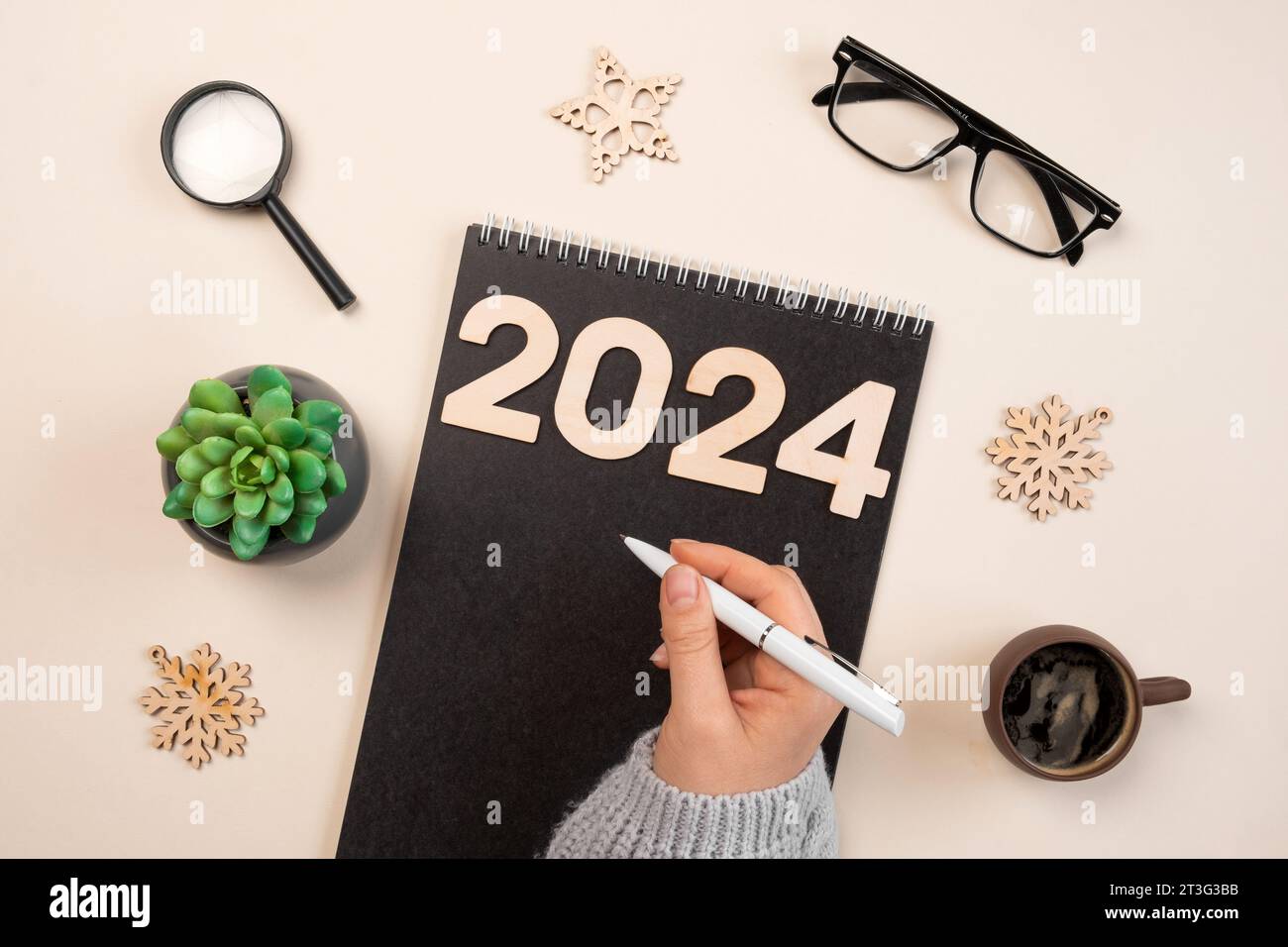 New Year Aims 2024. To Do List. Empty Notebook at the Desk with Holiday