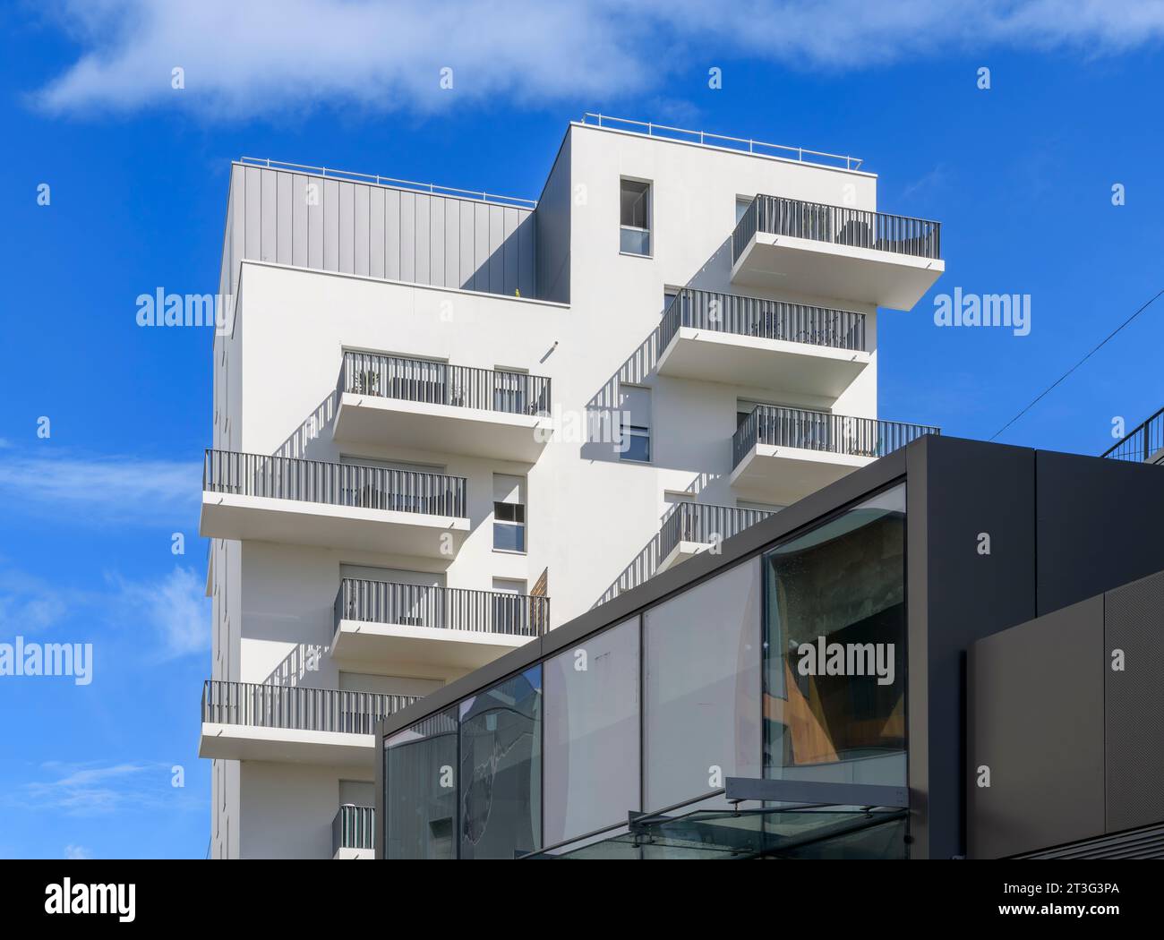 Smart modern apartments in a new development in northern Bordeaux called Ginkgo.With new shops, cafes and the Hapik rock climbing gym. Stock Photo