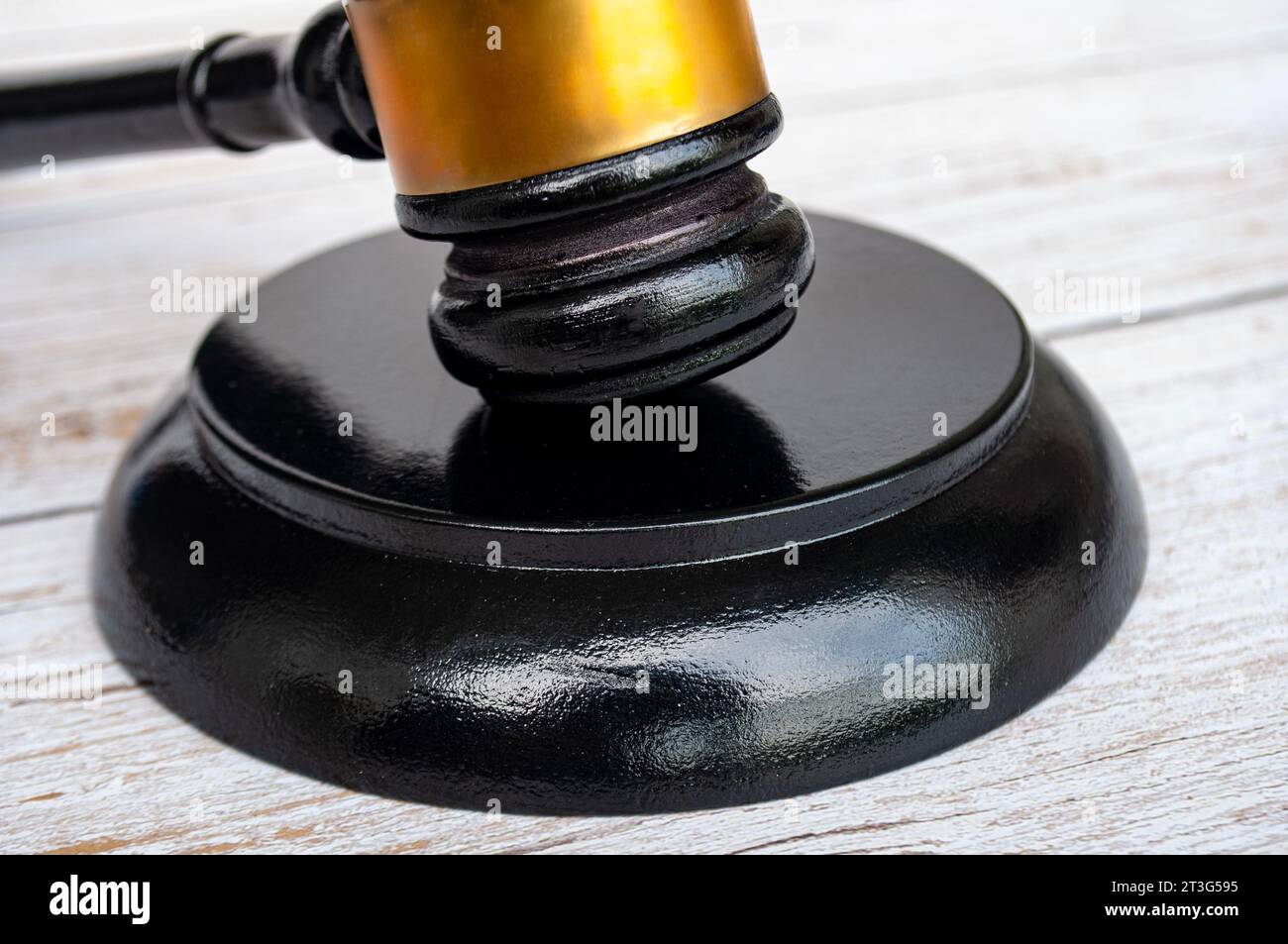 Close up of gavel on wooden cover background. Copy space and law concept. Stock Photo