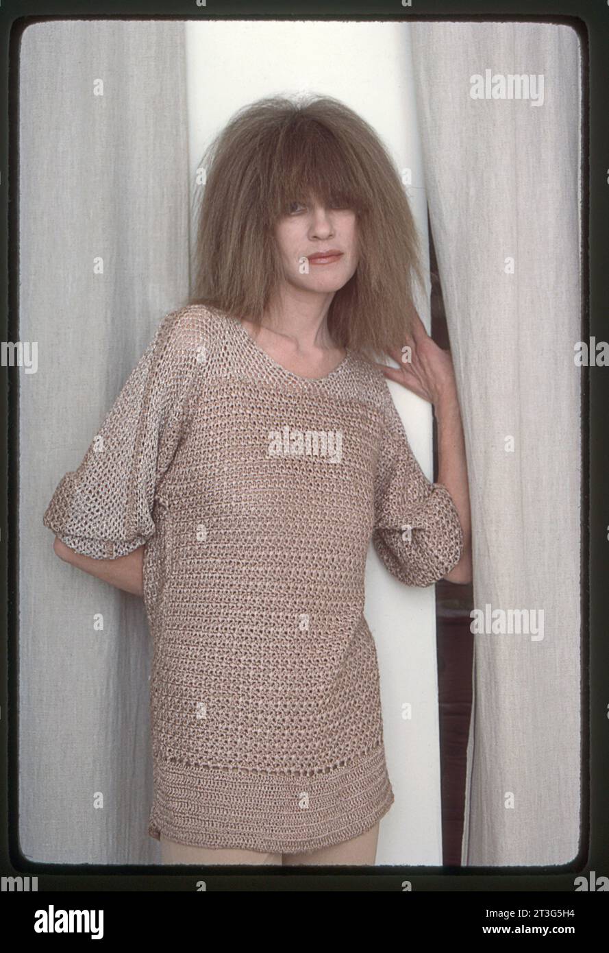 A 1983 posed color portrait of Carla Bley, an avant garde jazz, composer, pianist and proponent of free jazz . In her studio  in Manhattan Stock Photo