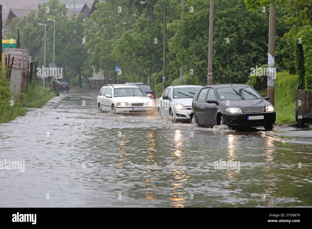 Many Vehicles Driving Through Flooded Street Water Floods Stock Photo ...
