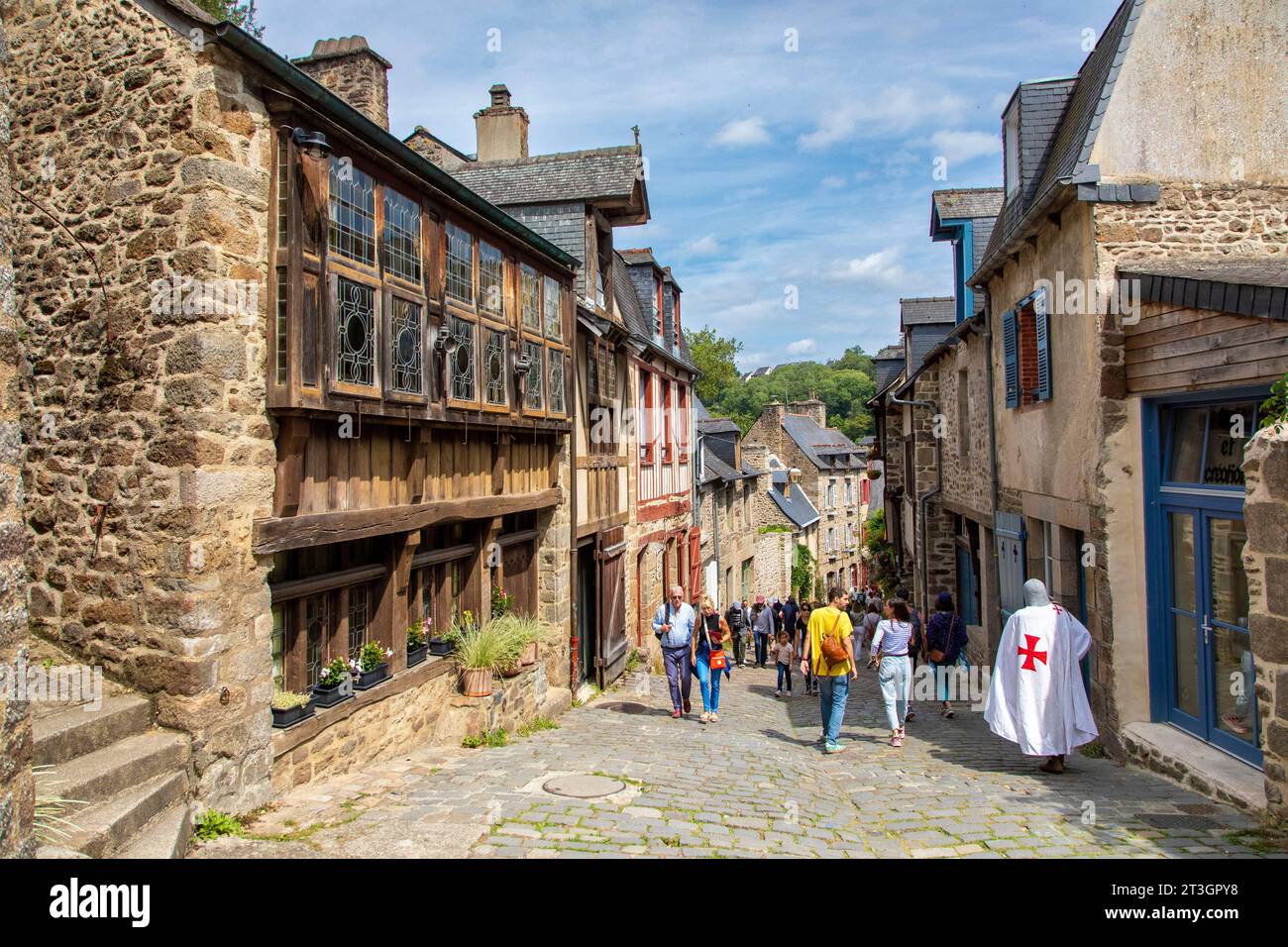 France, Cotes-d'Armor, Dinan, the old town, medieval houses of Petit Fort street during the rampart festival Stock Photo